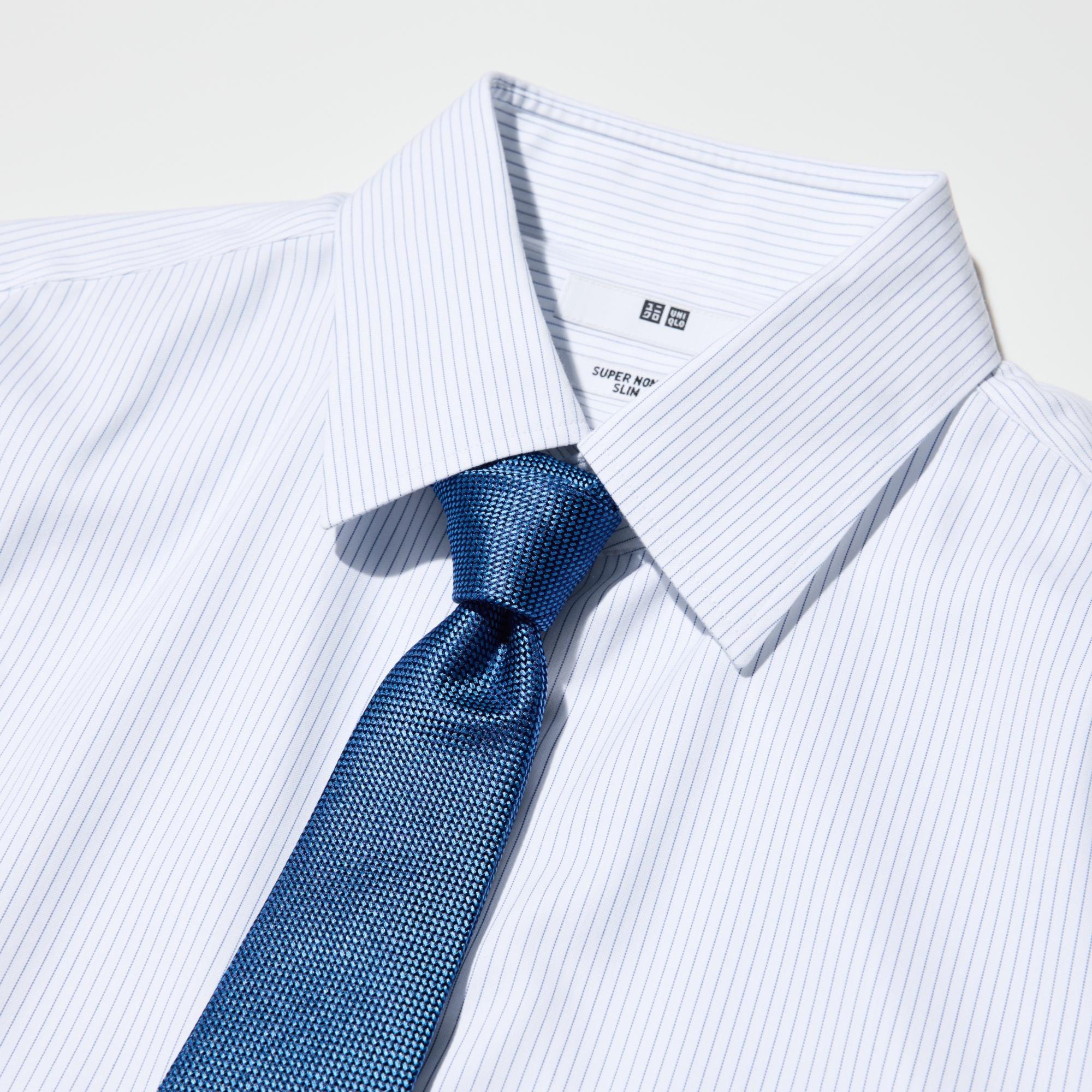 The collar band height and collar shape are designed to look good with a necktie.
