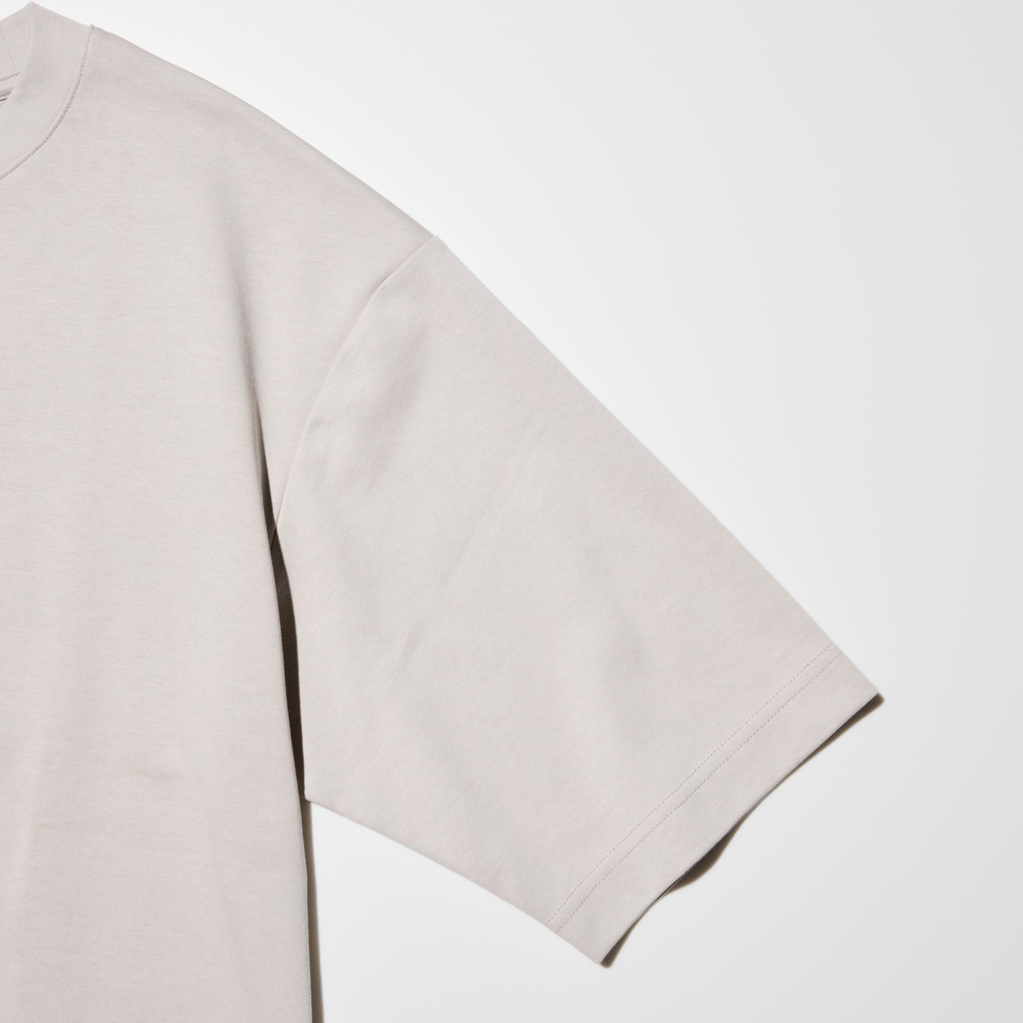 Oversized cut with half-length sleeves and dropped shoulders for a relaxed feel.