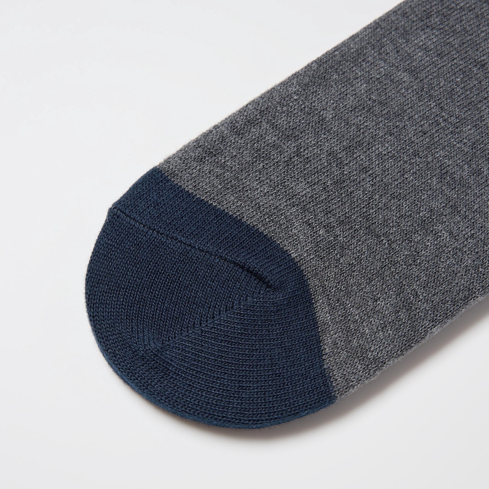 The toe and heel are reinforced to prevent holes and ensure long-lasting wear.