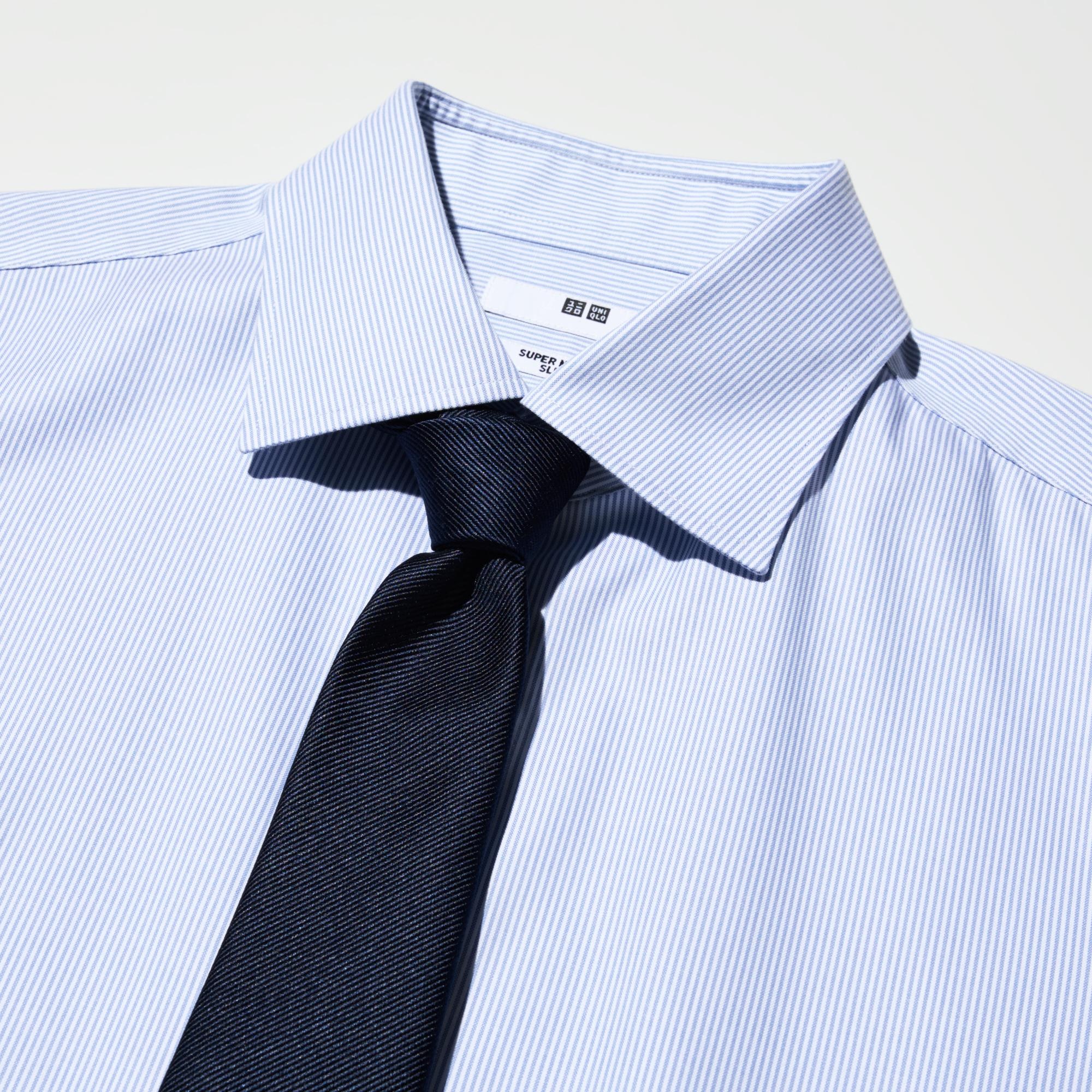 The collar band height and collar shape are designed to look good with a necktie.