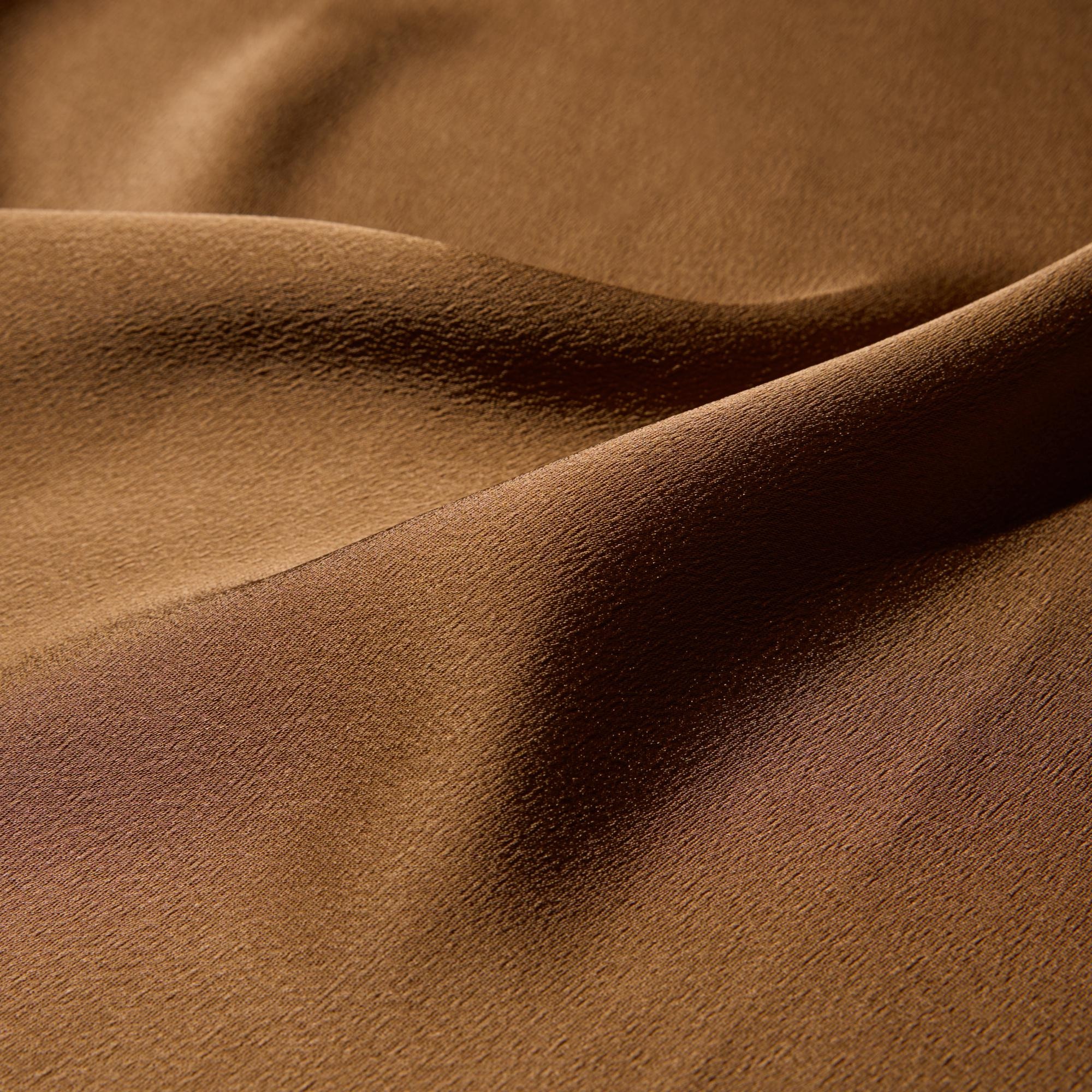 Versatile design in smooth, glossy satin fabric.