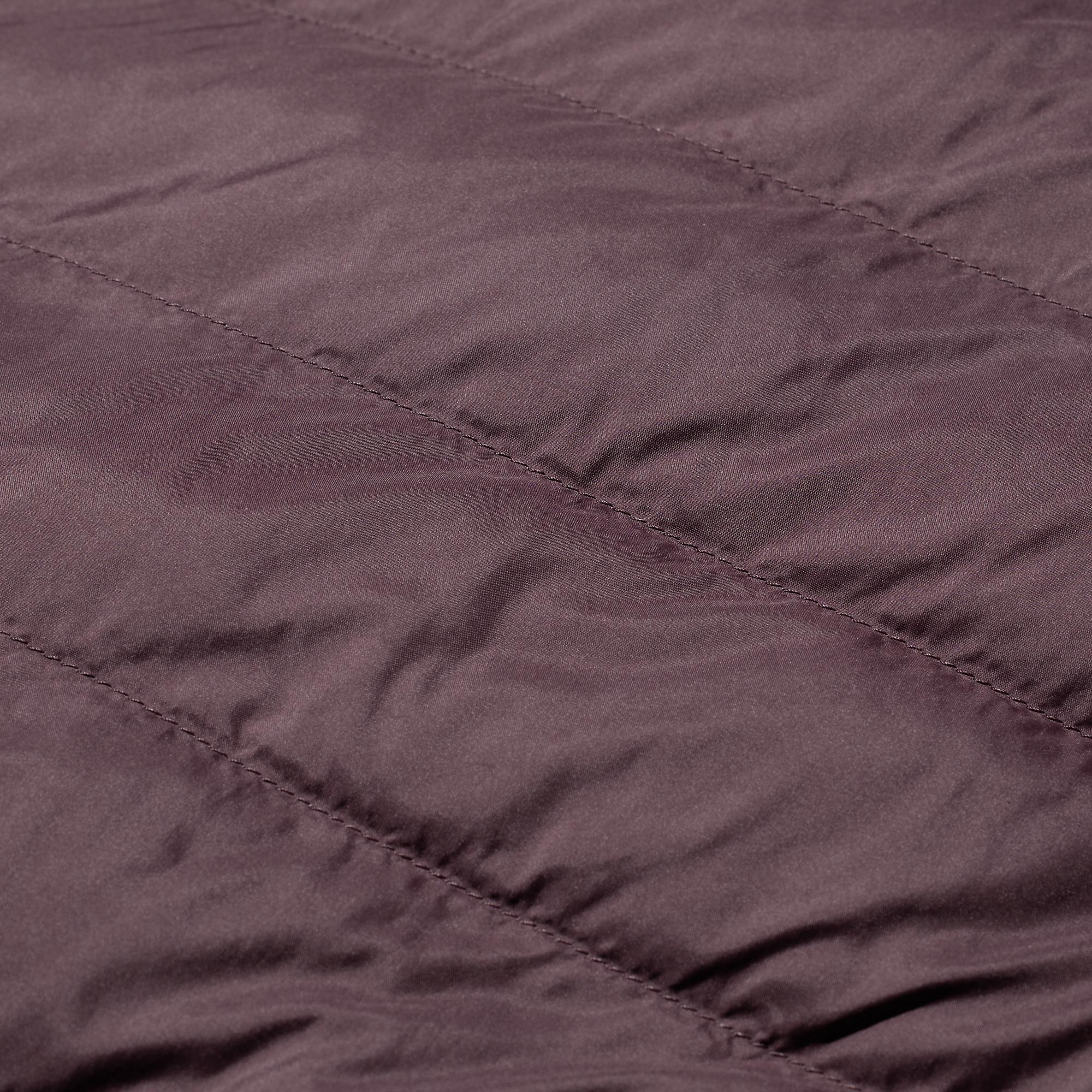 High-performance hollow fiber padding traps air for warmth.