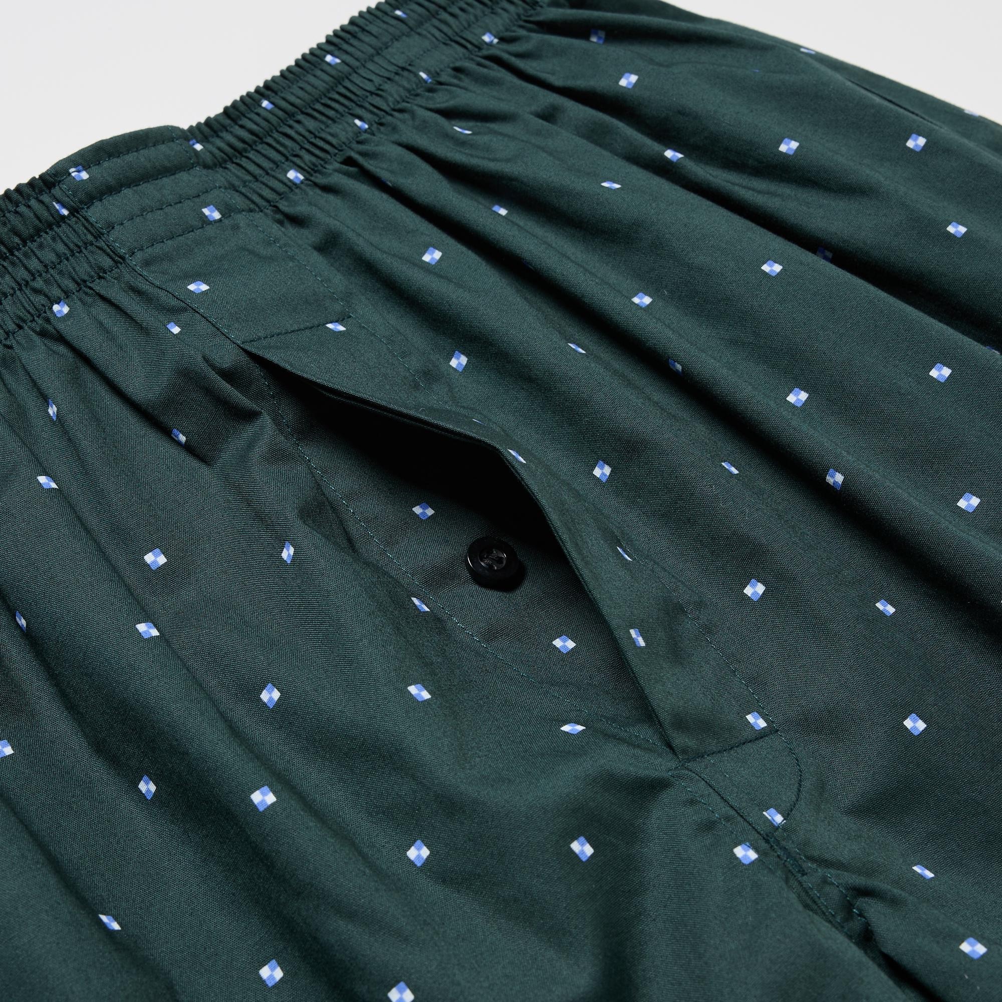 Sleek button-up fly front design. Side slits for easy movement.