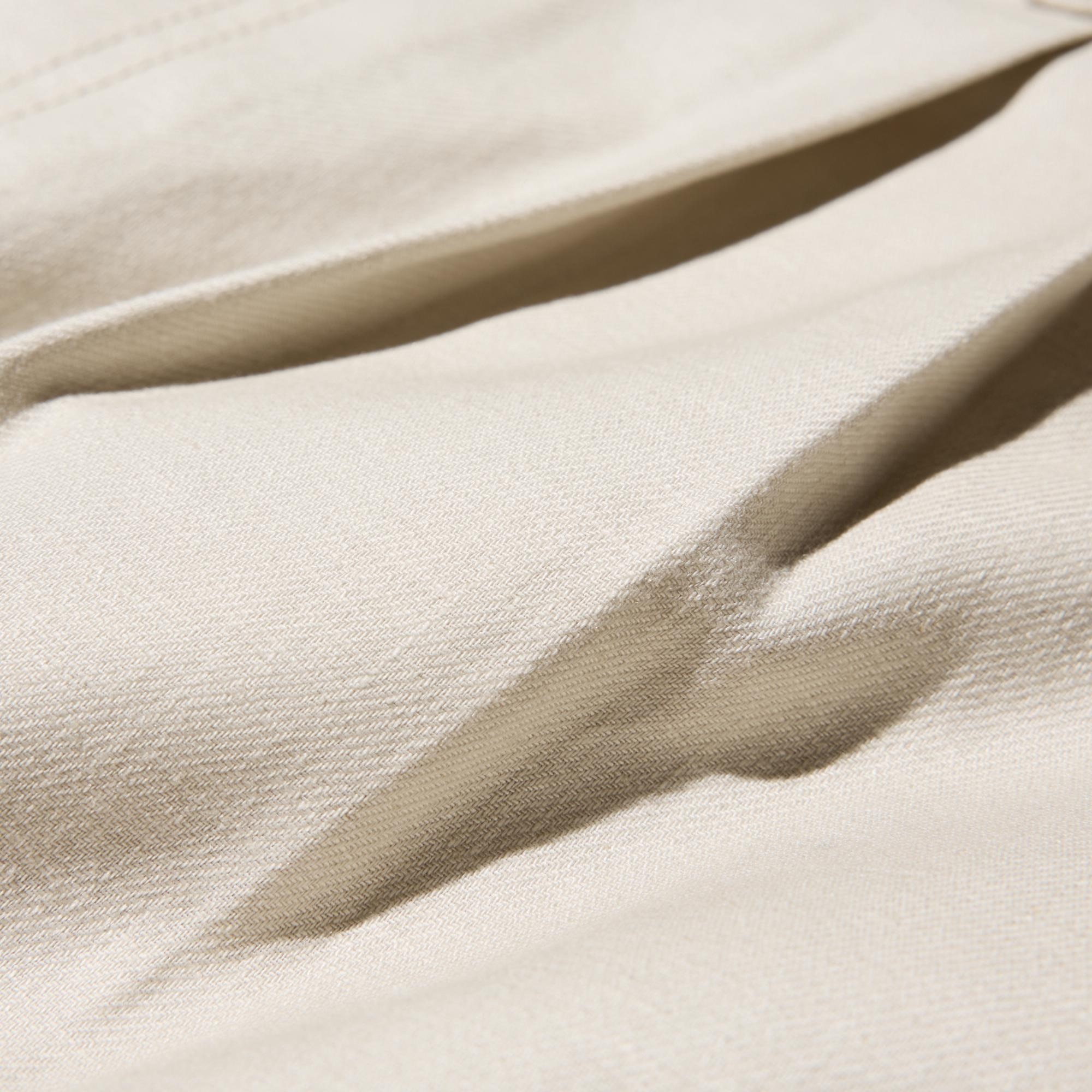 Blended fabric combines the cool feel of linen and the softness of cotton. Natural wrinkled texture.