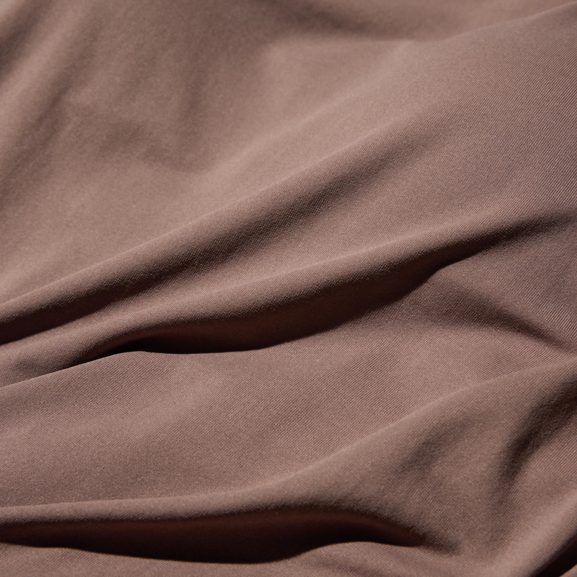 Smooth fabric with DRY technology, Cool to the Touch, moisture-wicking, deodorizing, and stretch comfort features.