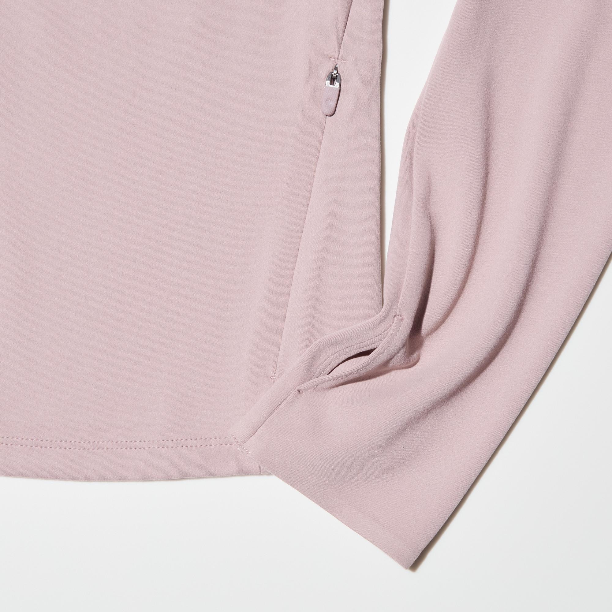 Long sleeves with thumb holes keep the back of the hands covered.