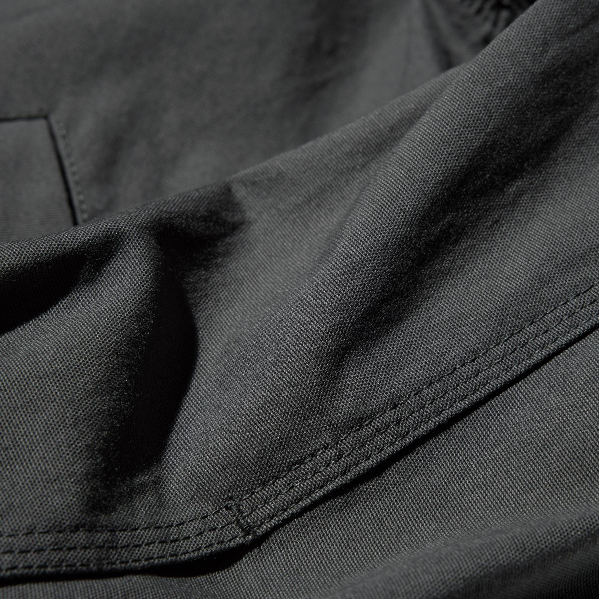 Cotton blend fabric with a crisp, tailored look.