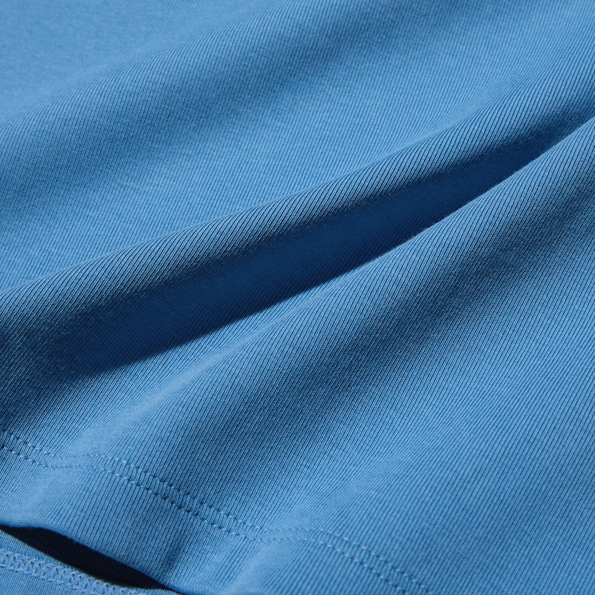 Natural cotton-blend fabric with a smooth surface and soft texture.