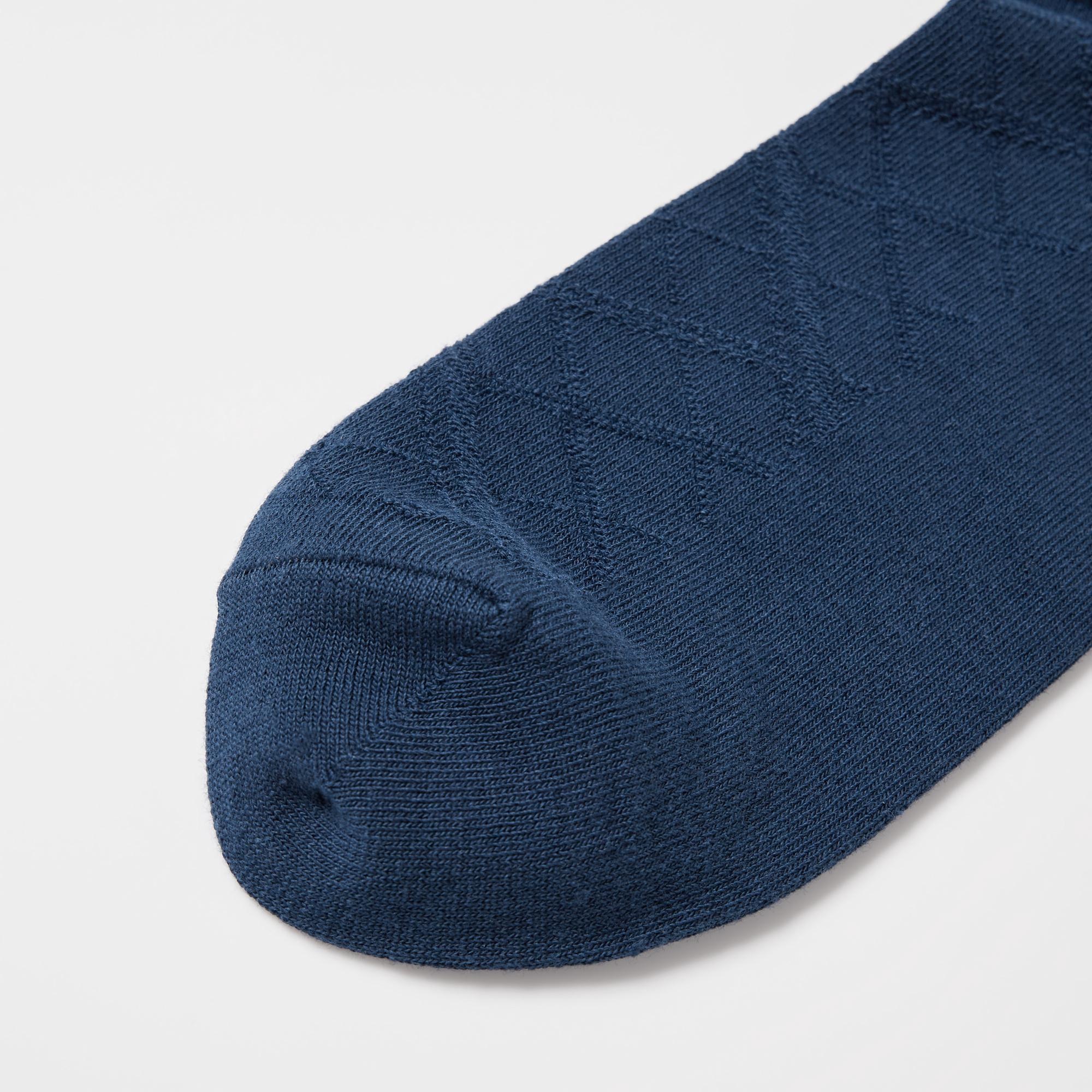The toe and heel are reinforced to prevent holes and ensure long-lasting wear.