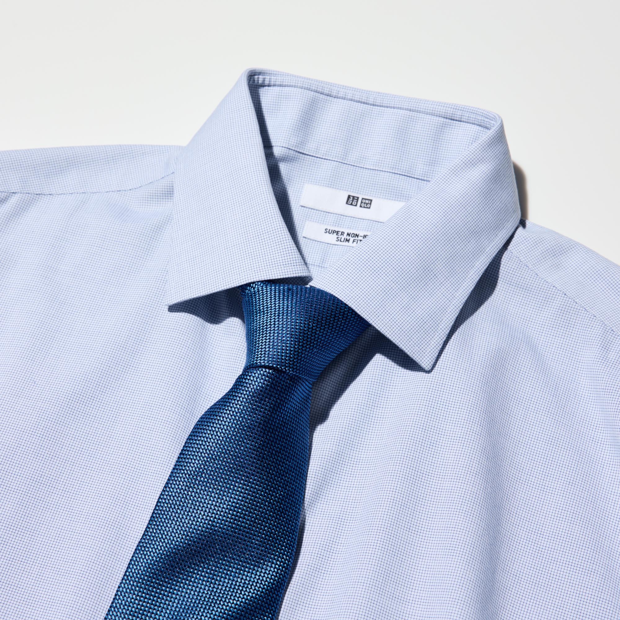 The collar band height and collar shape are designed to look good with a necktie.