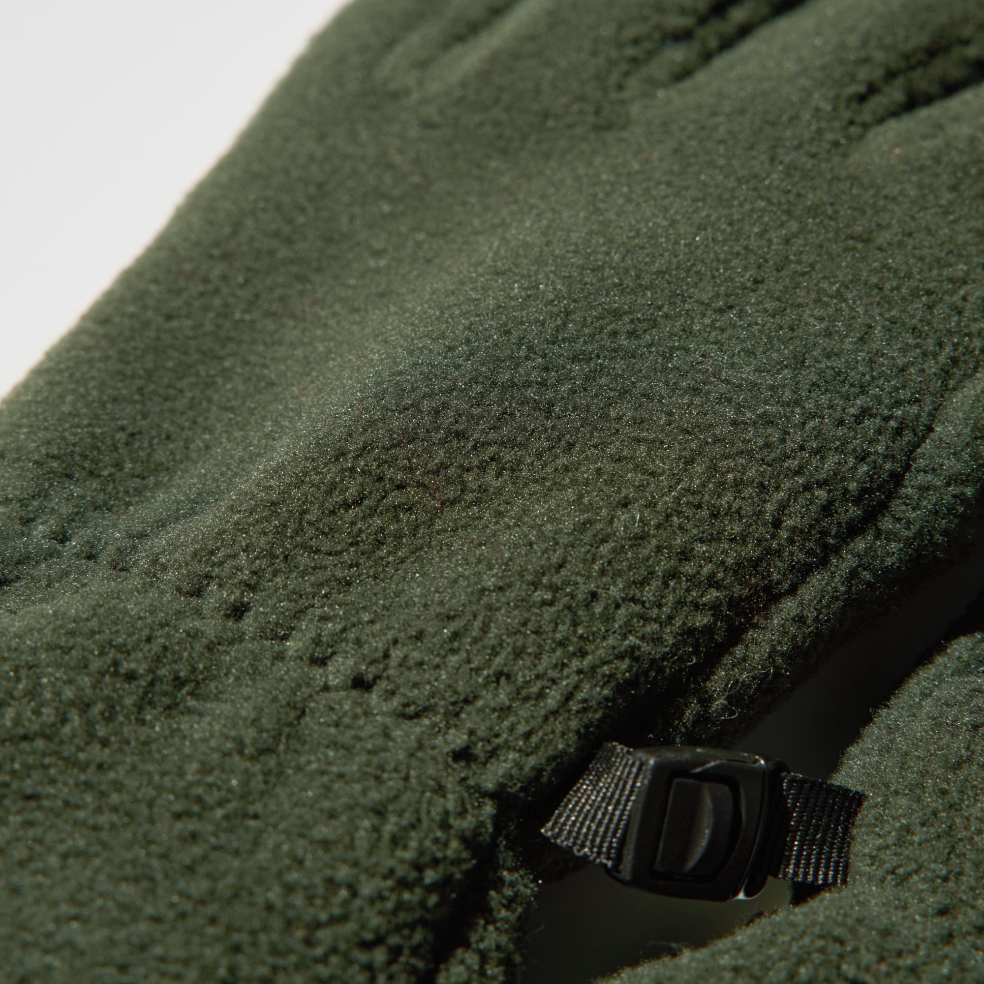 Windproof film layer inside the fleece keeps cold air out.