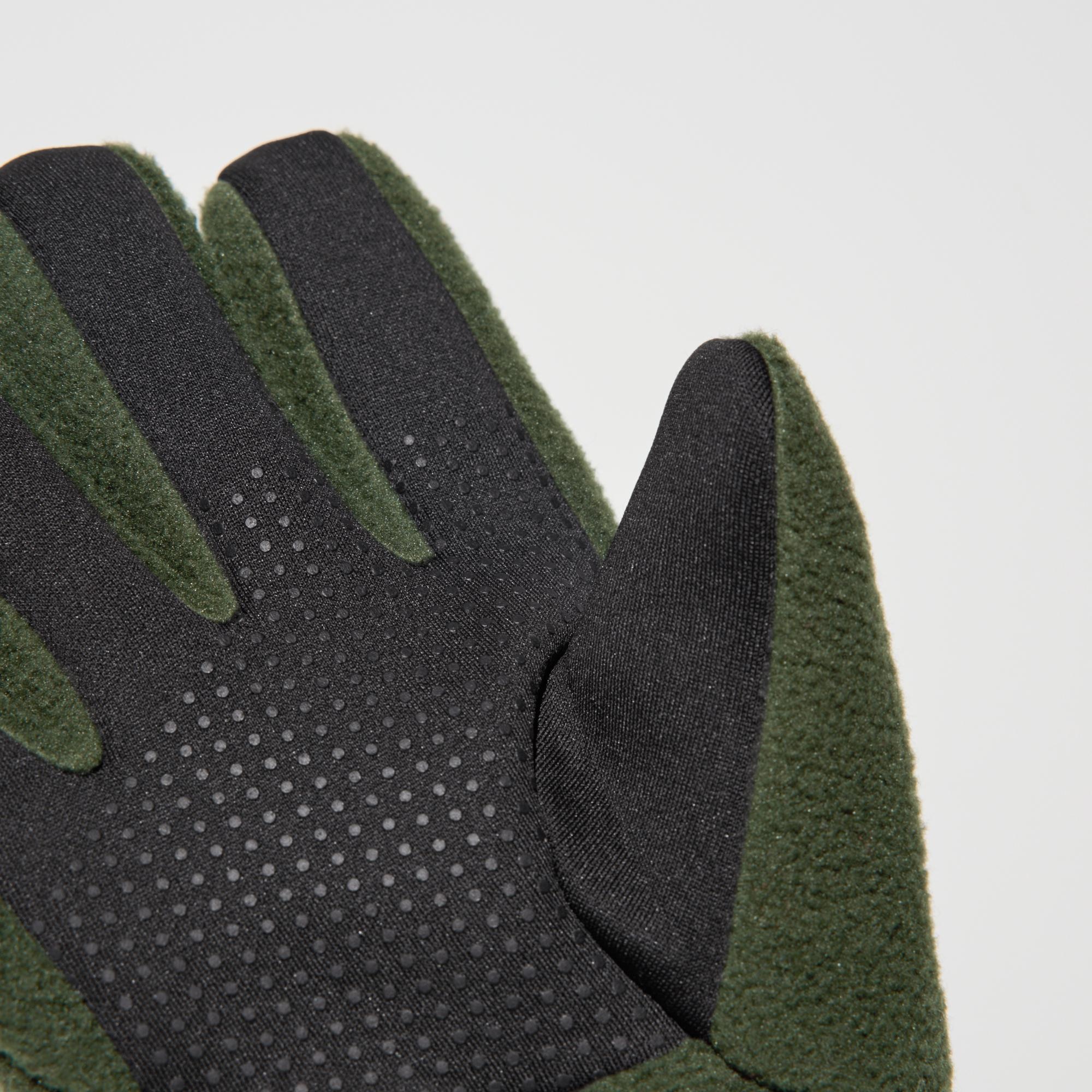 Touchscreen-sensitive pads at the tip of the thumb and index finger.