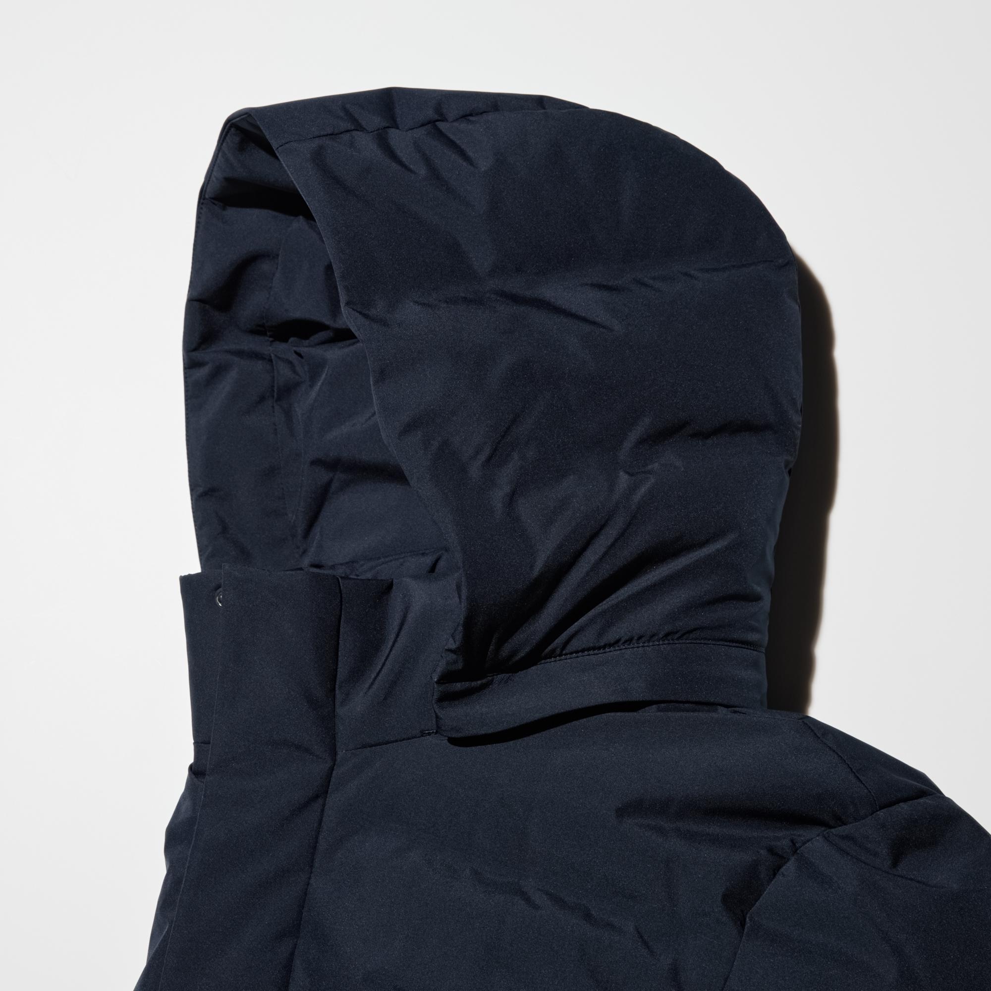 Hood fastener stows inside the collar, ensuring a neat look.