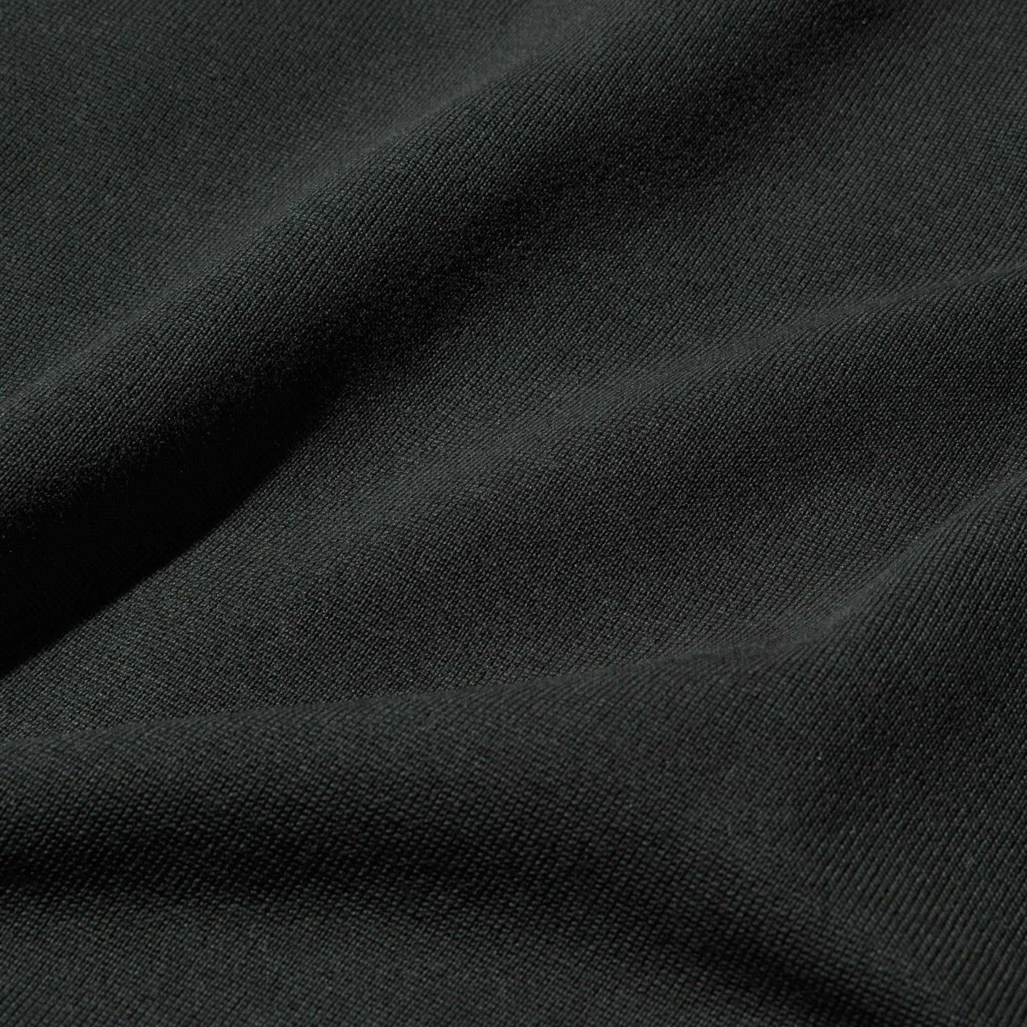 Unified knit from the body to the hem for a refined, minimal style.