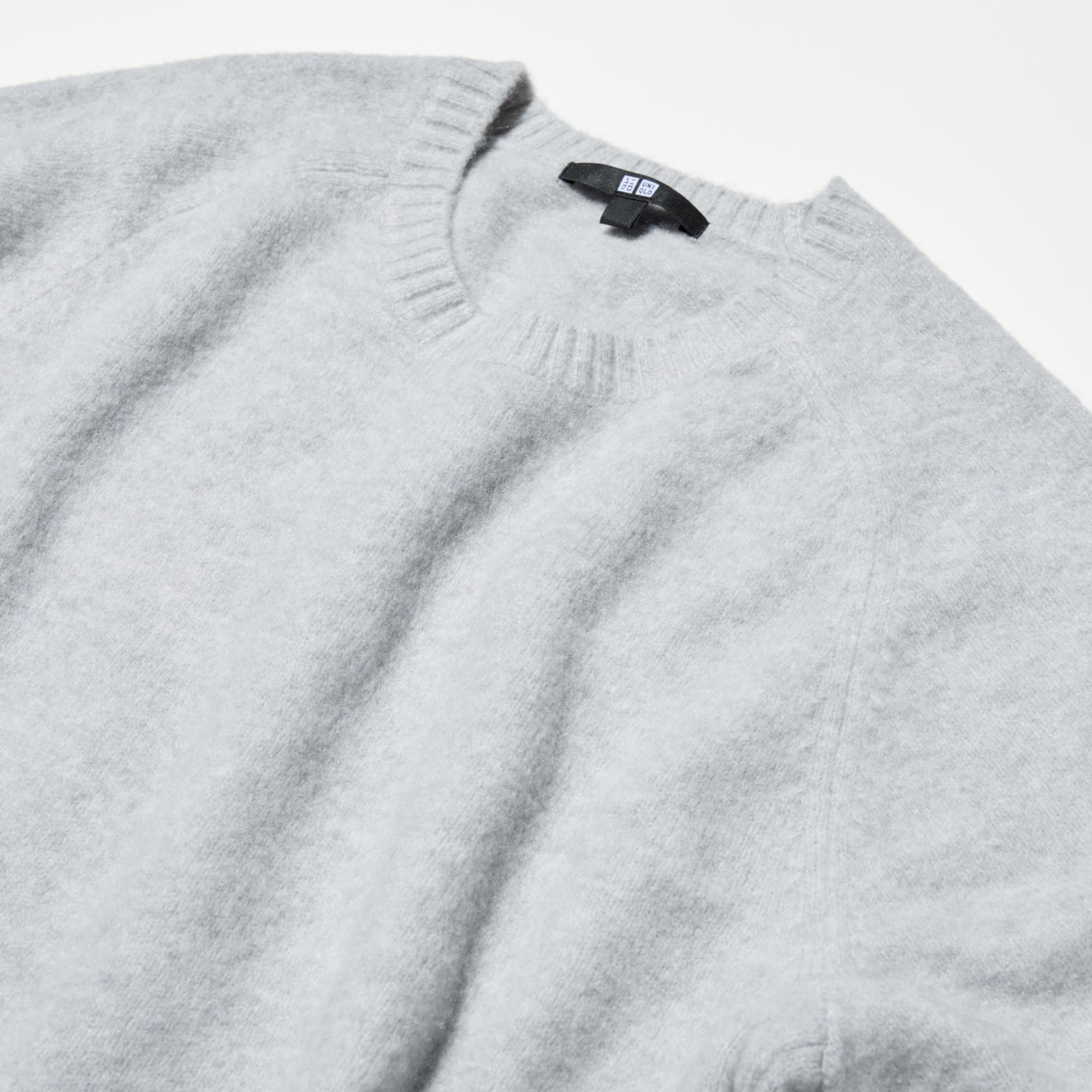 Updated raglan sleeves and ribbed knit create a casual style.