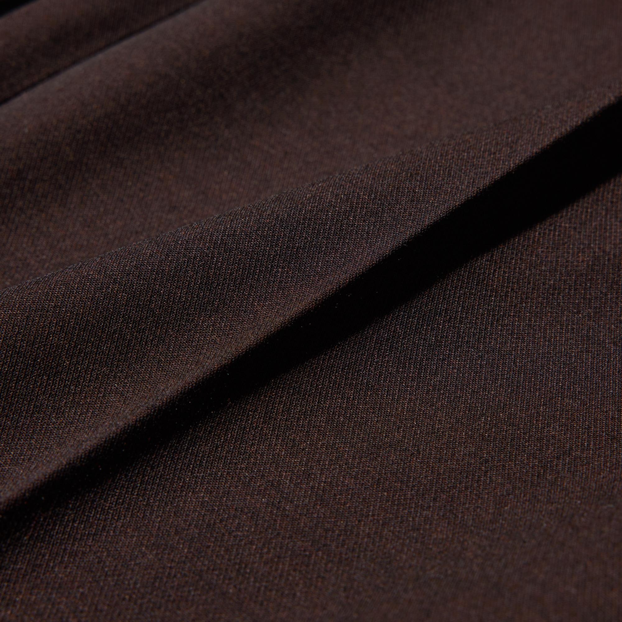 Updated in crisp fabric for a sleek, flattering fit and a modern look.