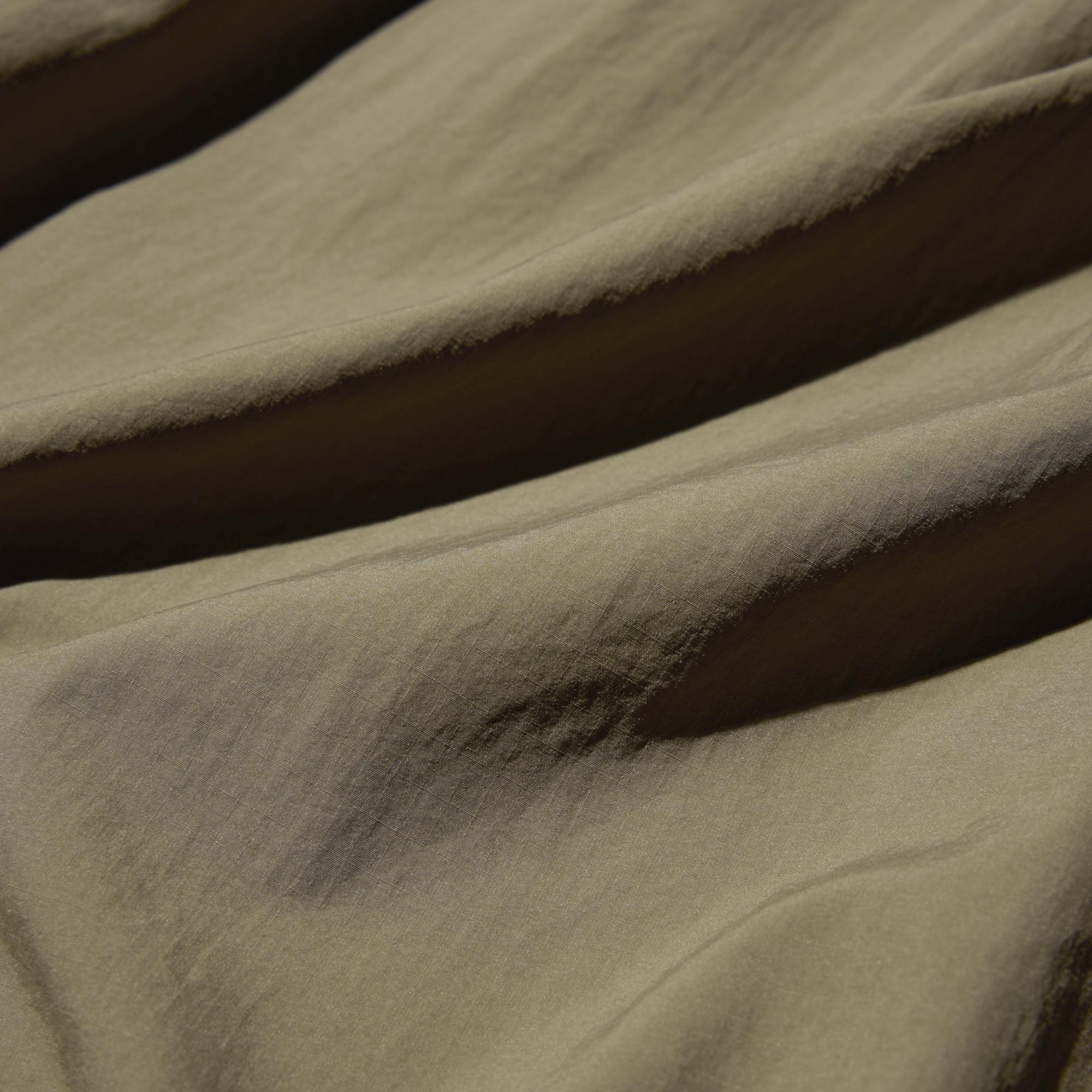 Cropped length in soft nylon fabric.