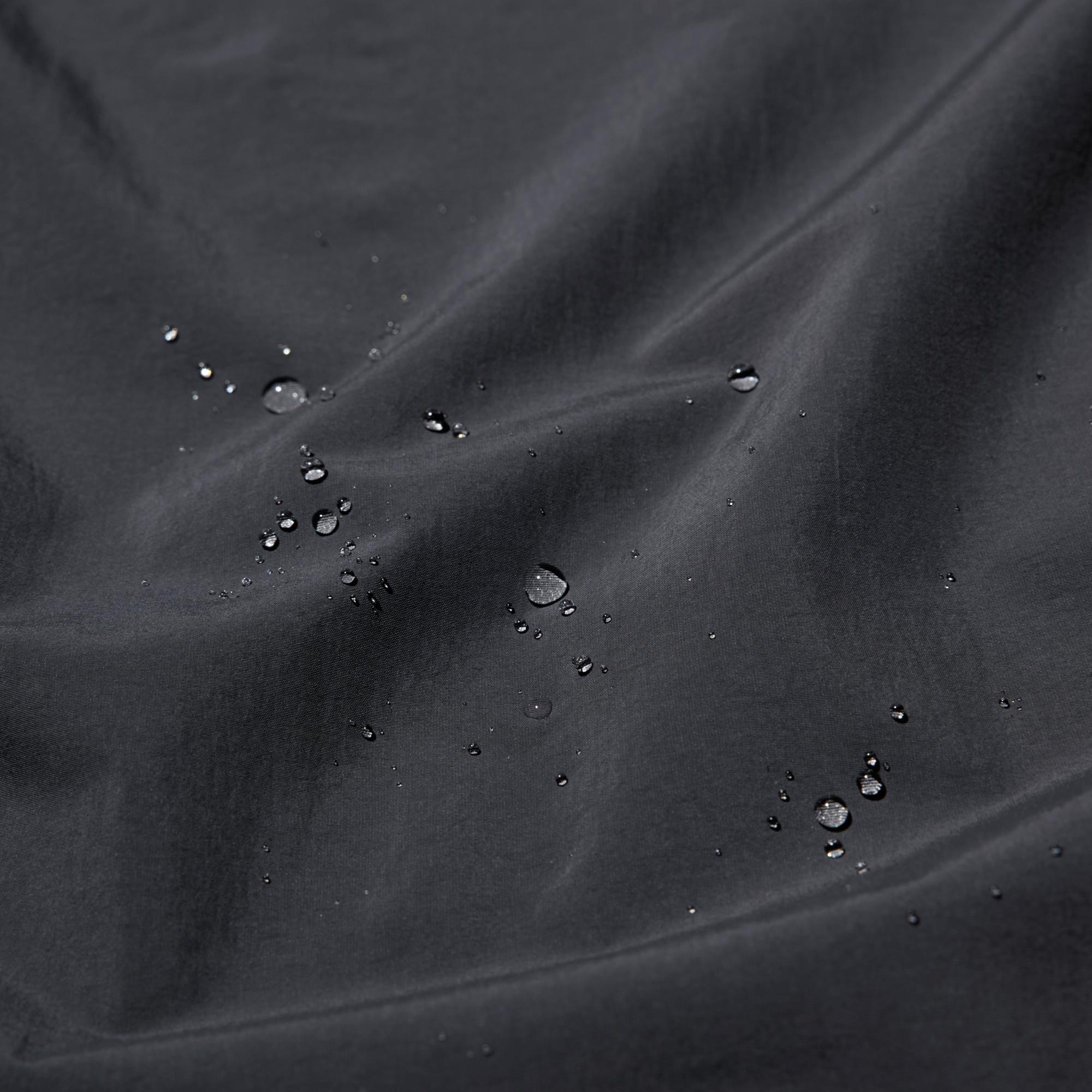 Lightweight, textured 2.5-layer nylon material. 'BLOCKTECH' with seam tape for enhanced water-resistance. High-performance fabric is windproof, breathable, and water-repellent. *The fabric is coated with a water-repellent agent so the effect lasts longer. The finish is not permanent.