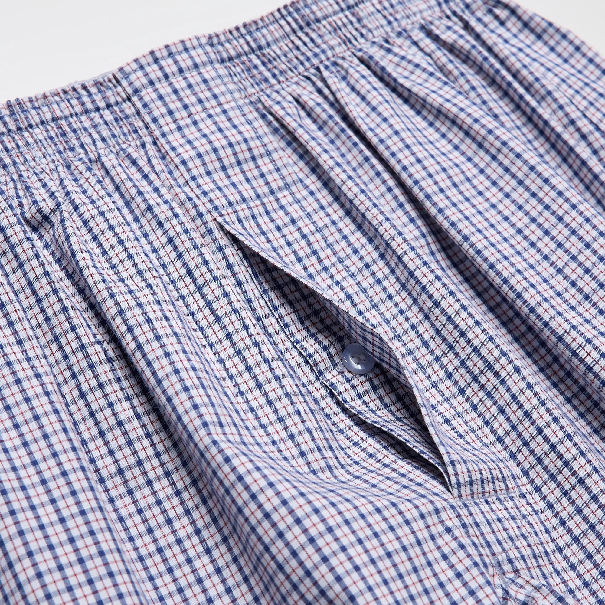 Sleek button-up fly front design. Side slits for easy movement.