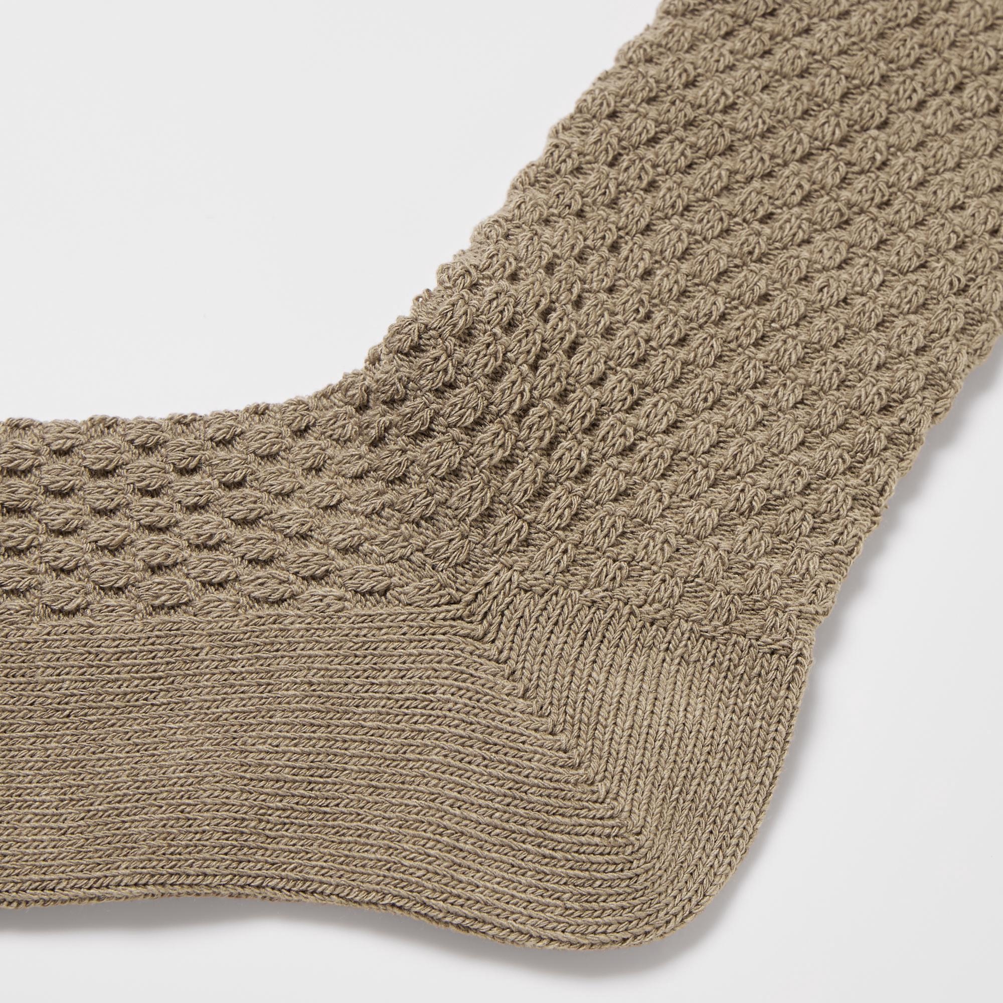 The toe and heel are reinforced to prevent holes and provide long-lasting wear.