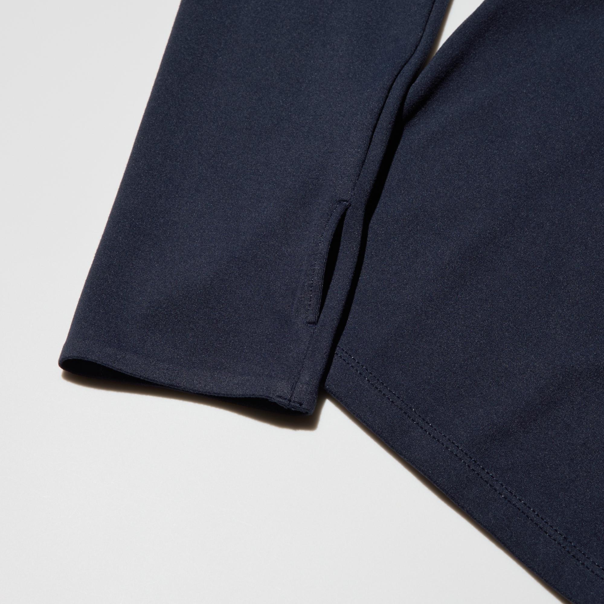 Long sleeves with thumb holes keep the backs of the hands covered.