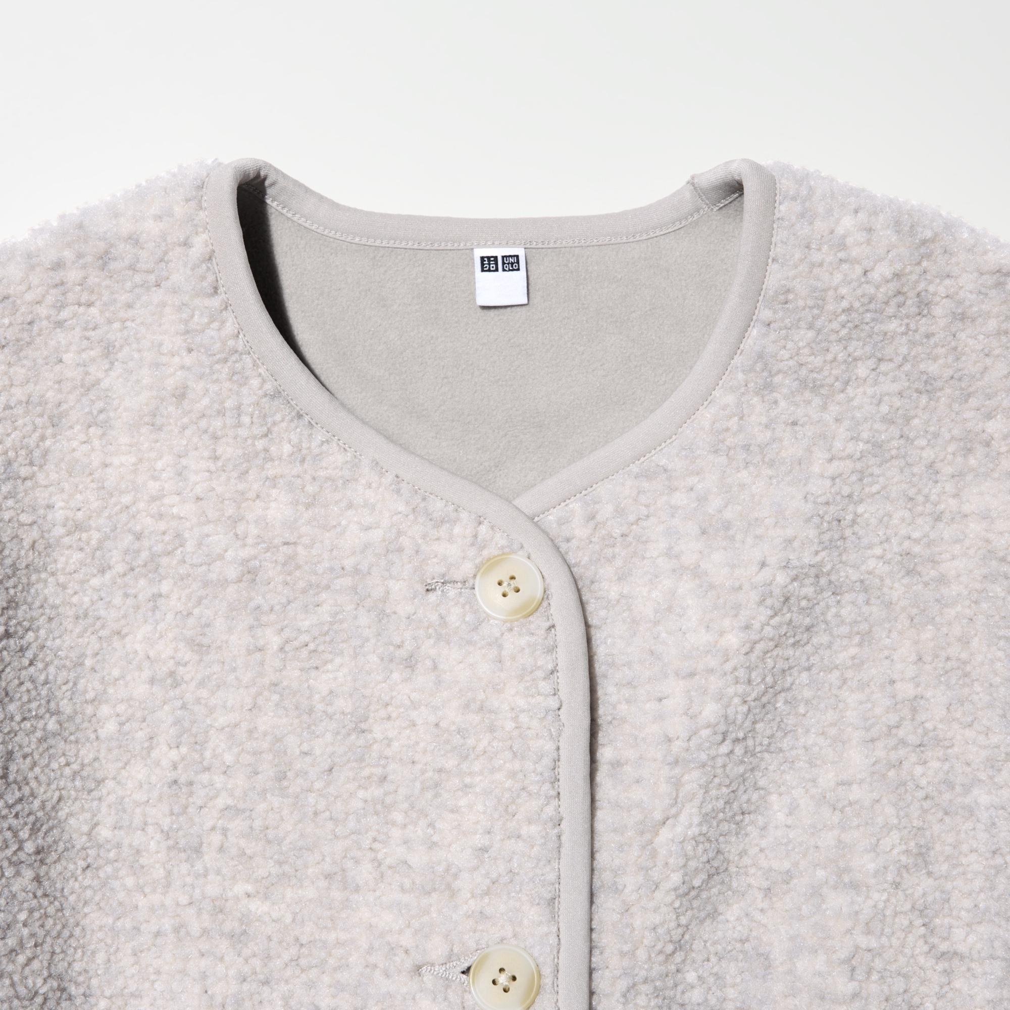 Collarless design can be worn as a middle or outer layer.