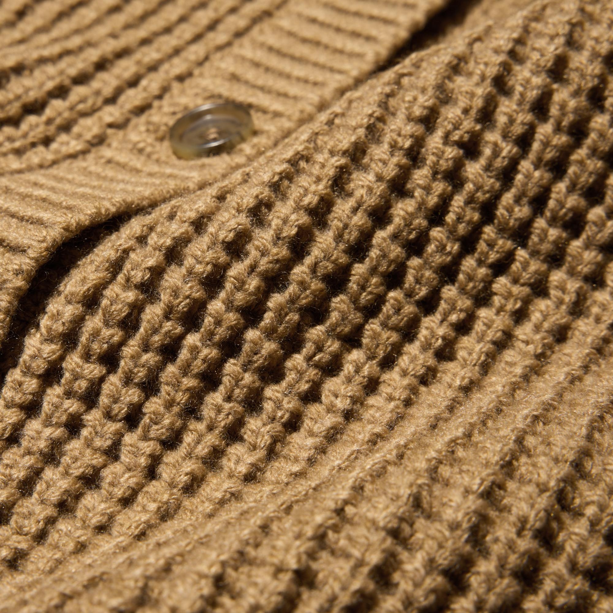 Waffle fabric with a textured feel. Puffy, non-itchy material.