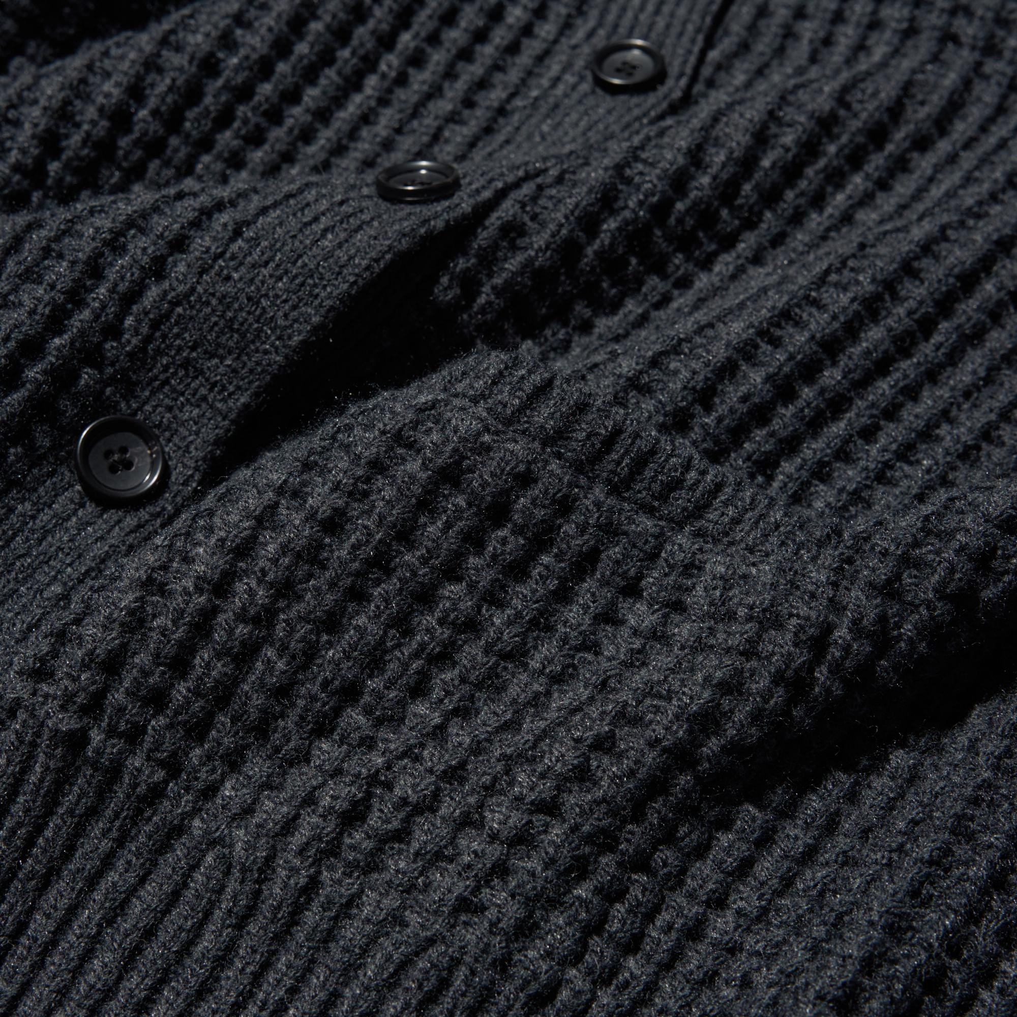 Waffle fabric with a textured feel. Puffy, non-itchy material.