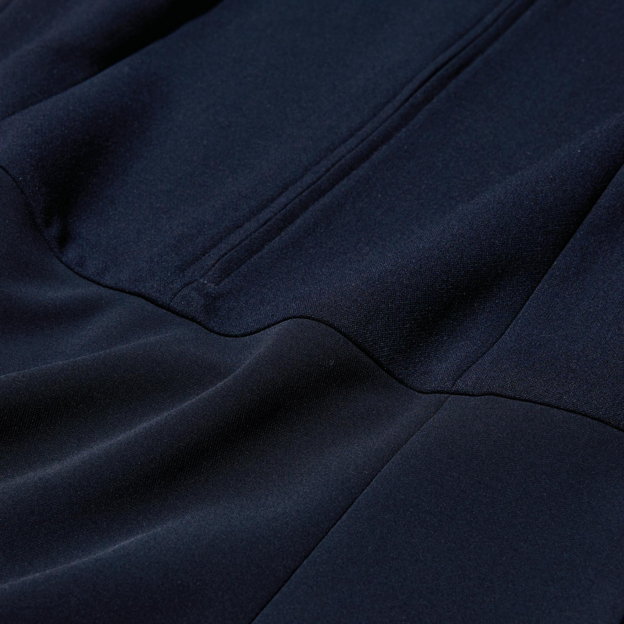 The skirt is made of a combination of materials, including a drapey material.