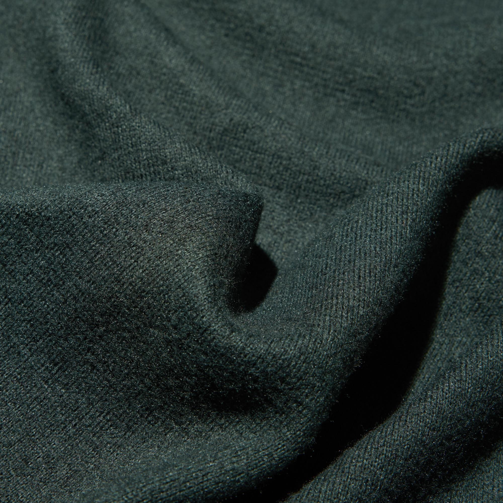 Soft, cozy fleece material with a knit-like texture and color. Firm, crisp great worn alone.