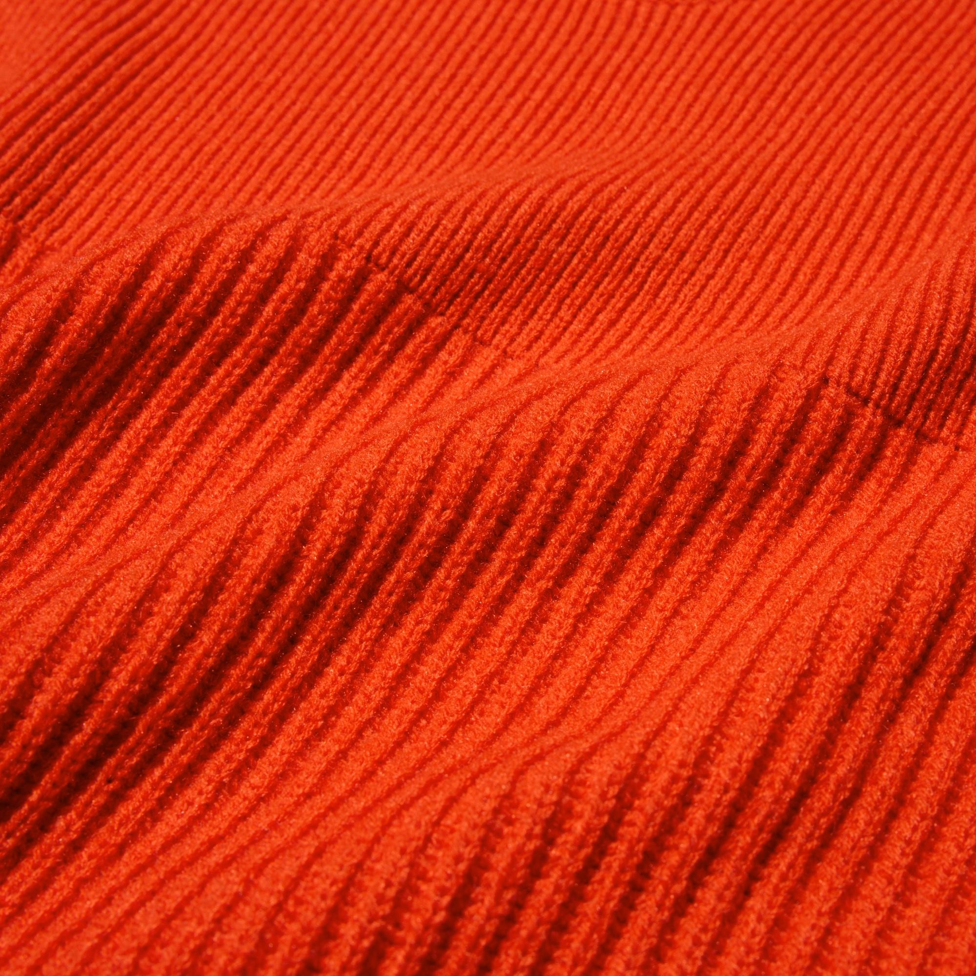 A fisherman’s sweater in a distinctive multi ribbed knit. Hand-washable.