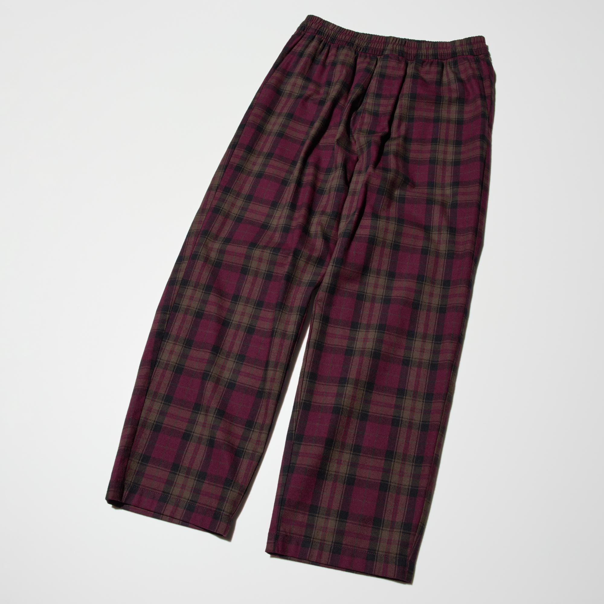 The silhouette is loose around the waist but tapers slightly below the knee for freedom of movement and comfort.