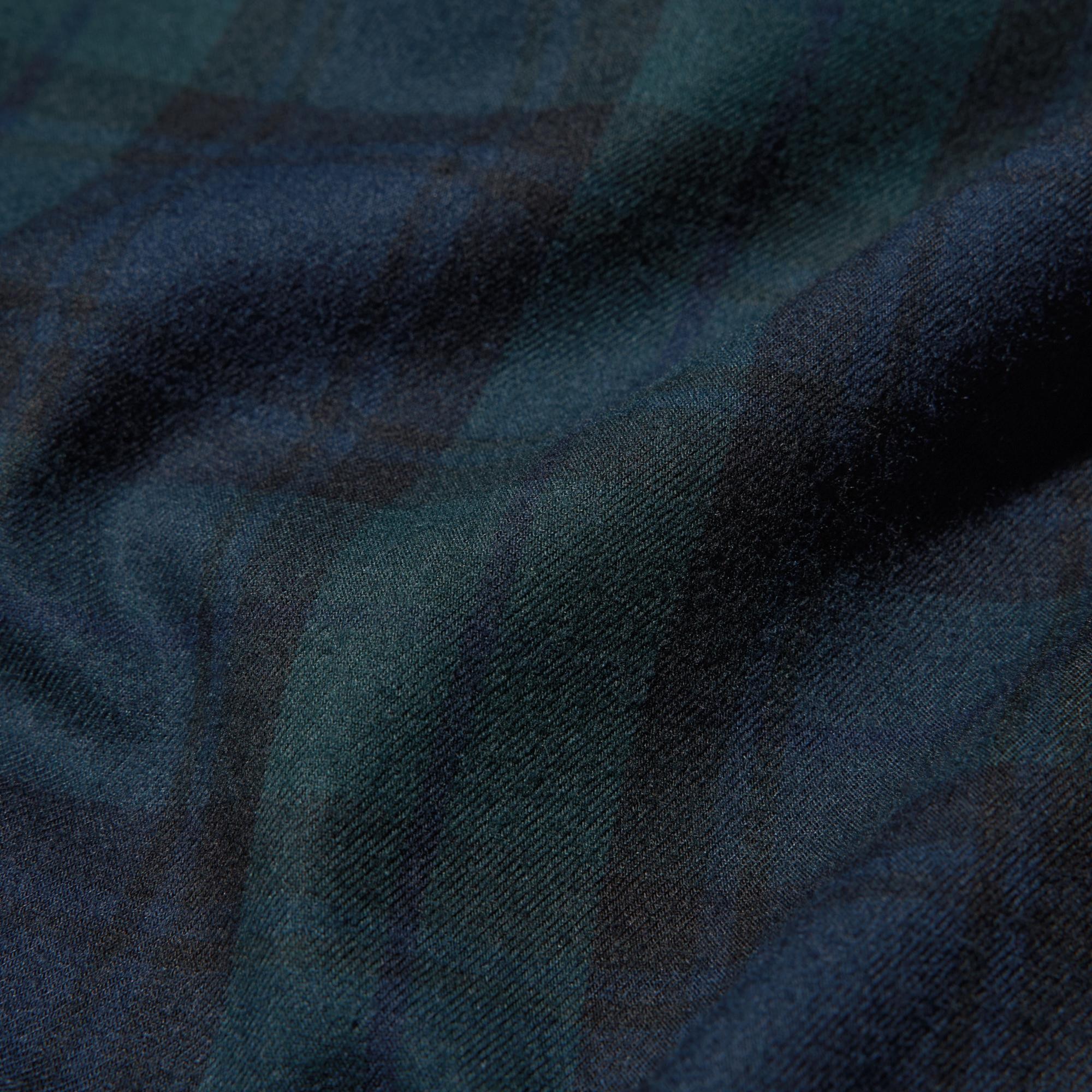 Warm cotton flannel fabric blended with rayon for a soft texture.