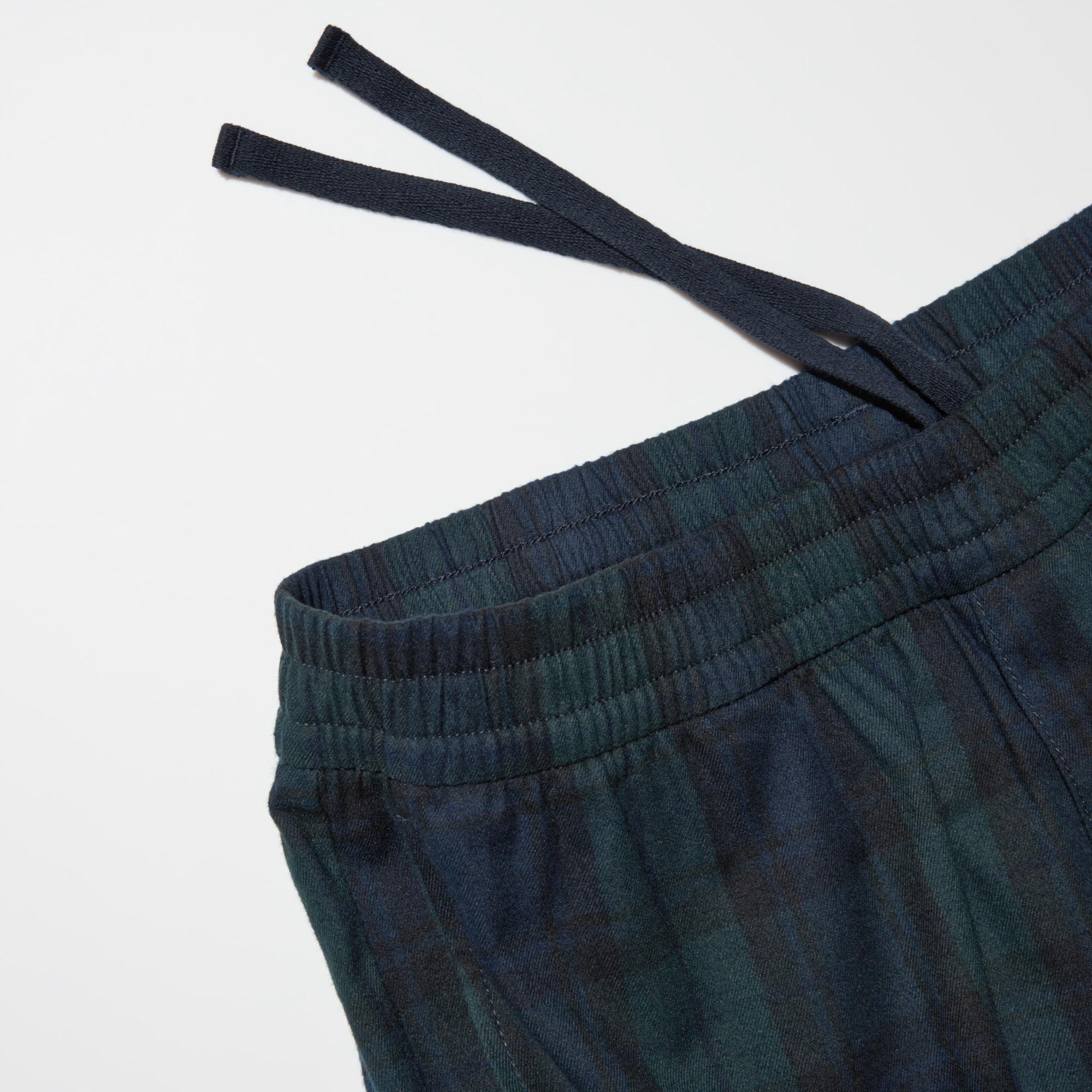 Elastic waist with a drawstring for size adjustment.