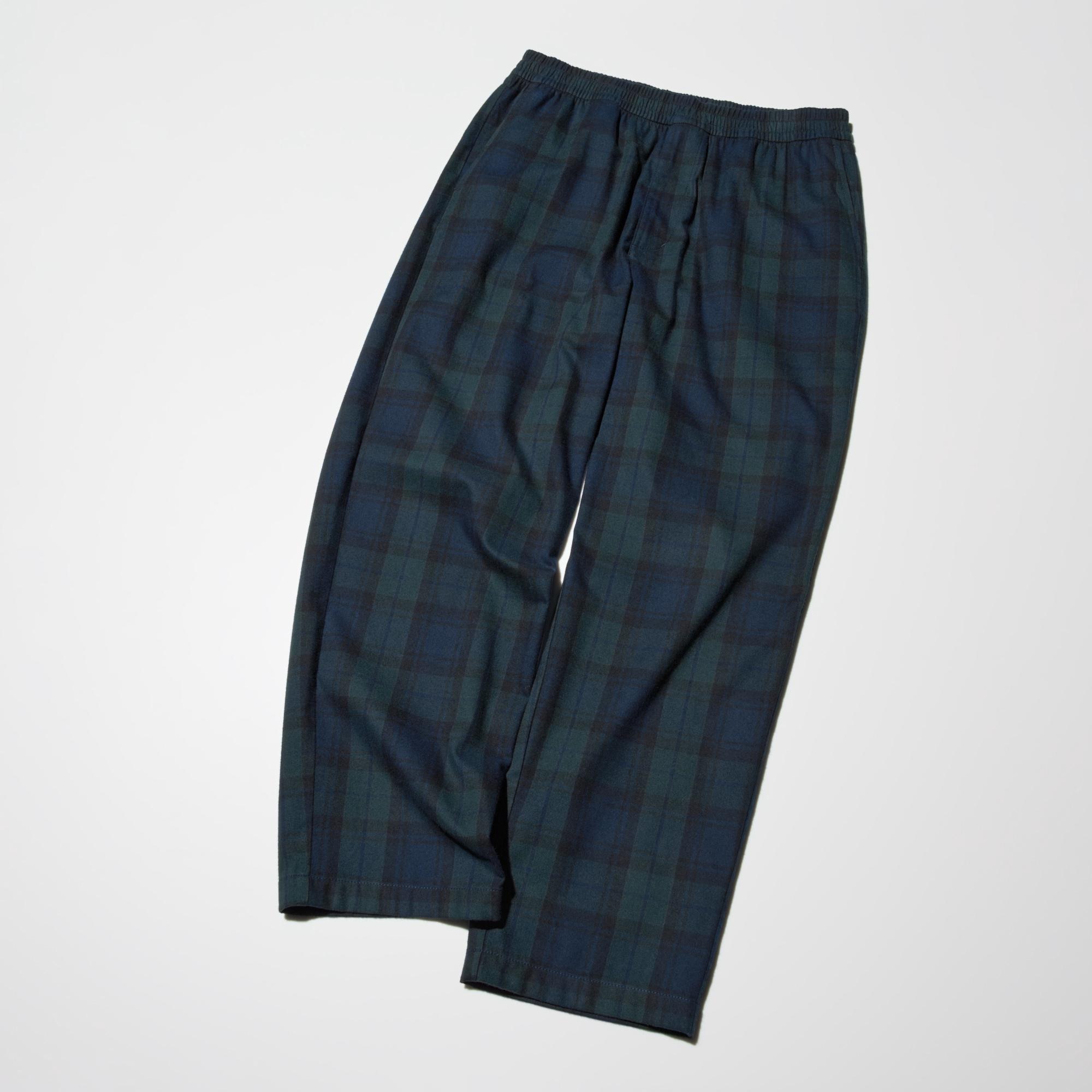 The silhouette is loose around the waist but tapers slightly below the knee for freedom of movement and comfort.