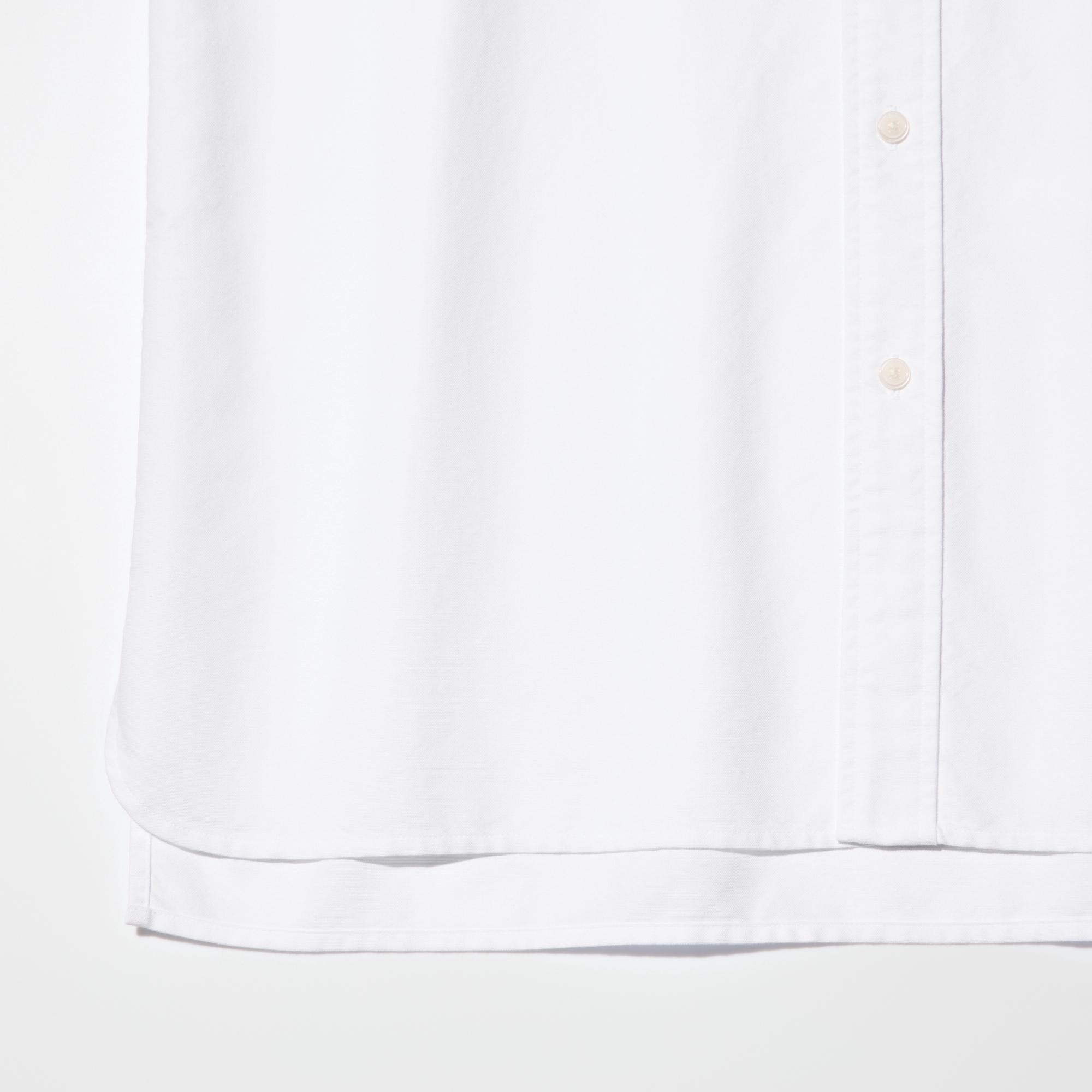 Longer length and a relaxed silhouette. Features a rounded front hem, contrasting with the straight back hem.