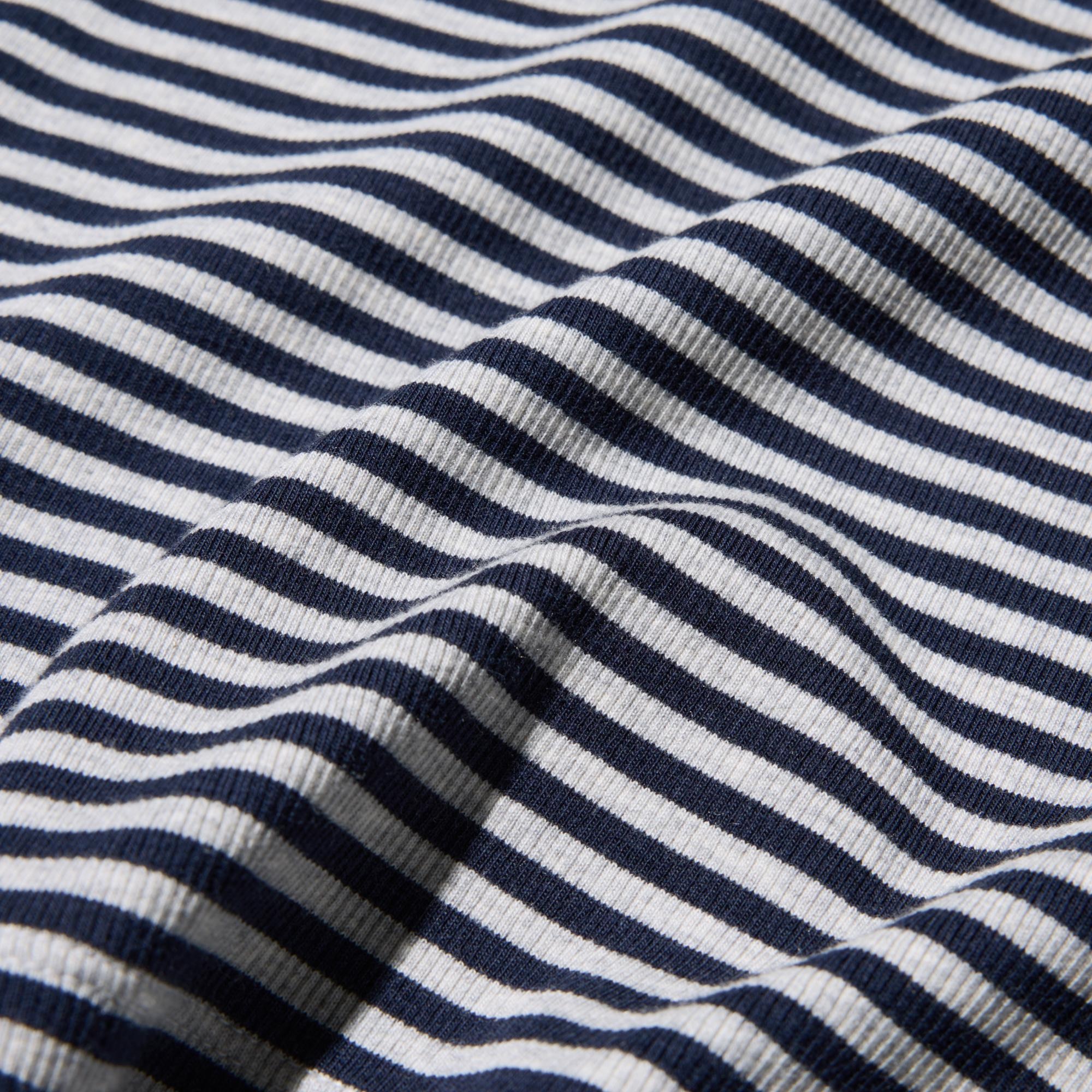 Soft cotton-blend ribbed fabric with a premium feel.
