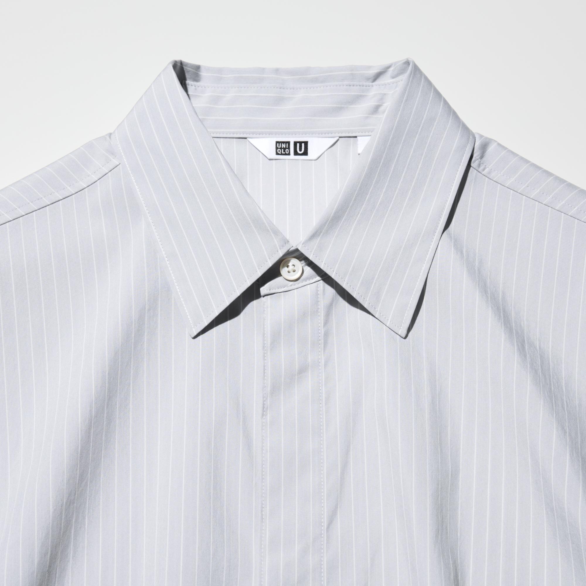 Spread collar design with a hidden slide buttons.