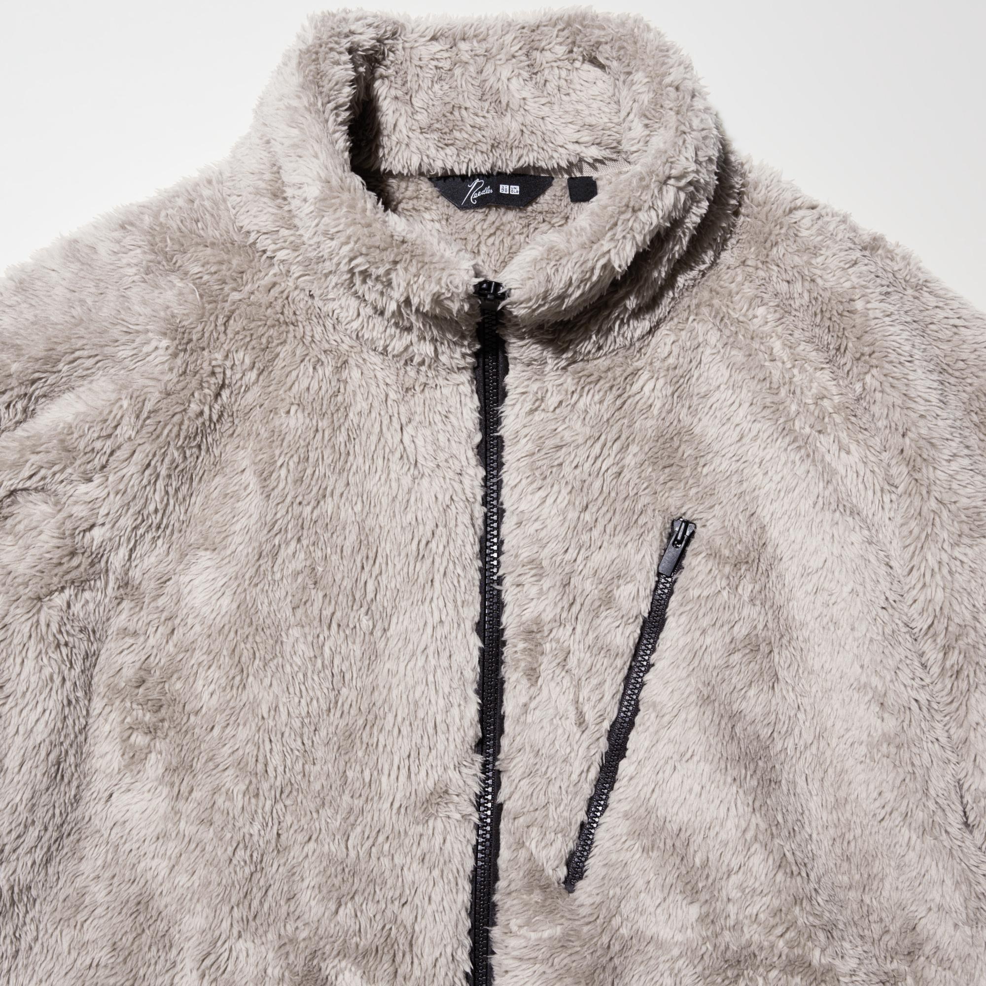 Made in collaboration with NEEDLES, featuring a distinctive slide fastener on the chest.