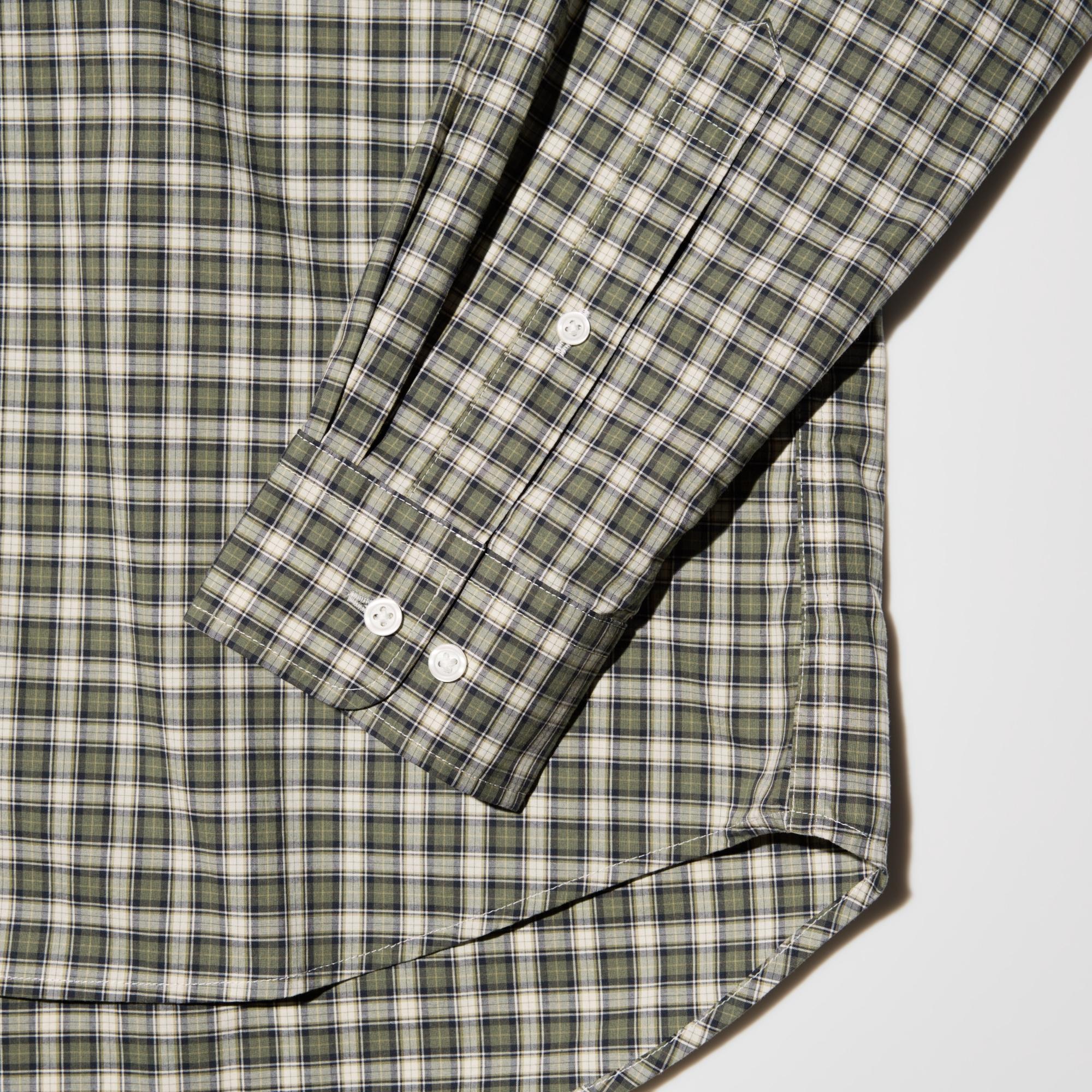 Patterns are carefully aligned by hand to ensure a symmetrical pattern at the collar, placket, sleeves, and cuffs.