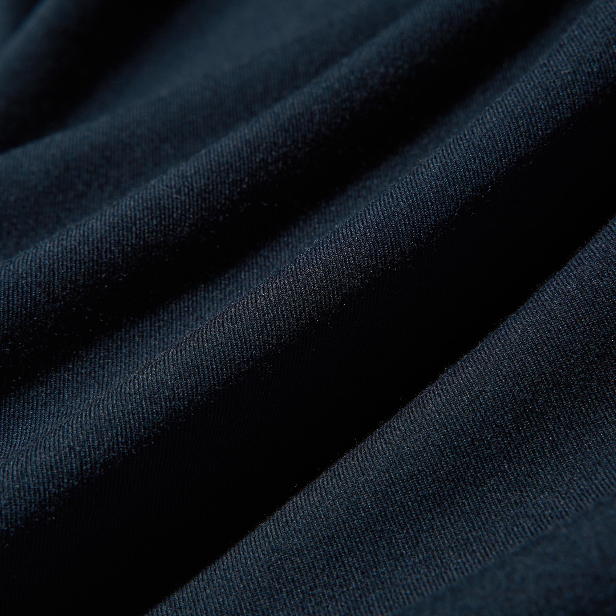 Warm polyester-rayon material with an elegant brushed feel.