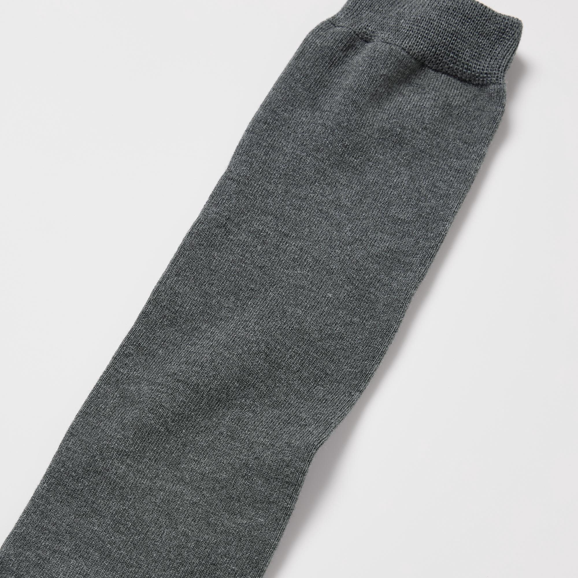 Flat, thin fabric, perfect for refined styling with loafers and boots.