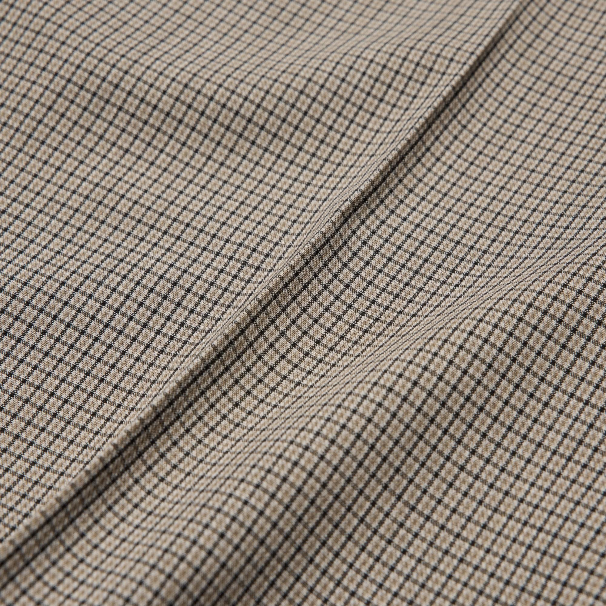 Updated in crisp fabric for a sleek, flattering fit and a modern look.