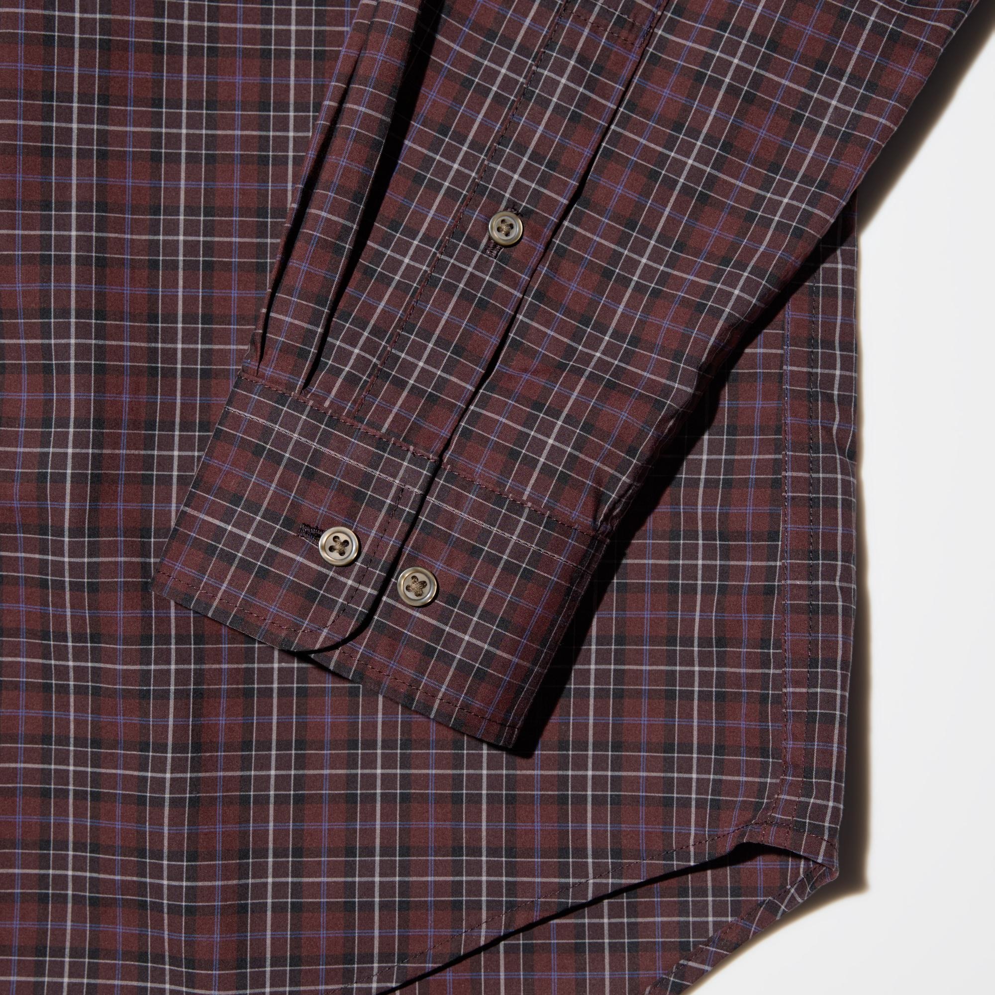 Patterns are carefully aligned by hand to ensure a symmetrical pattern at the collar, placket, sleeves, and cuffs.