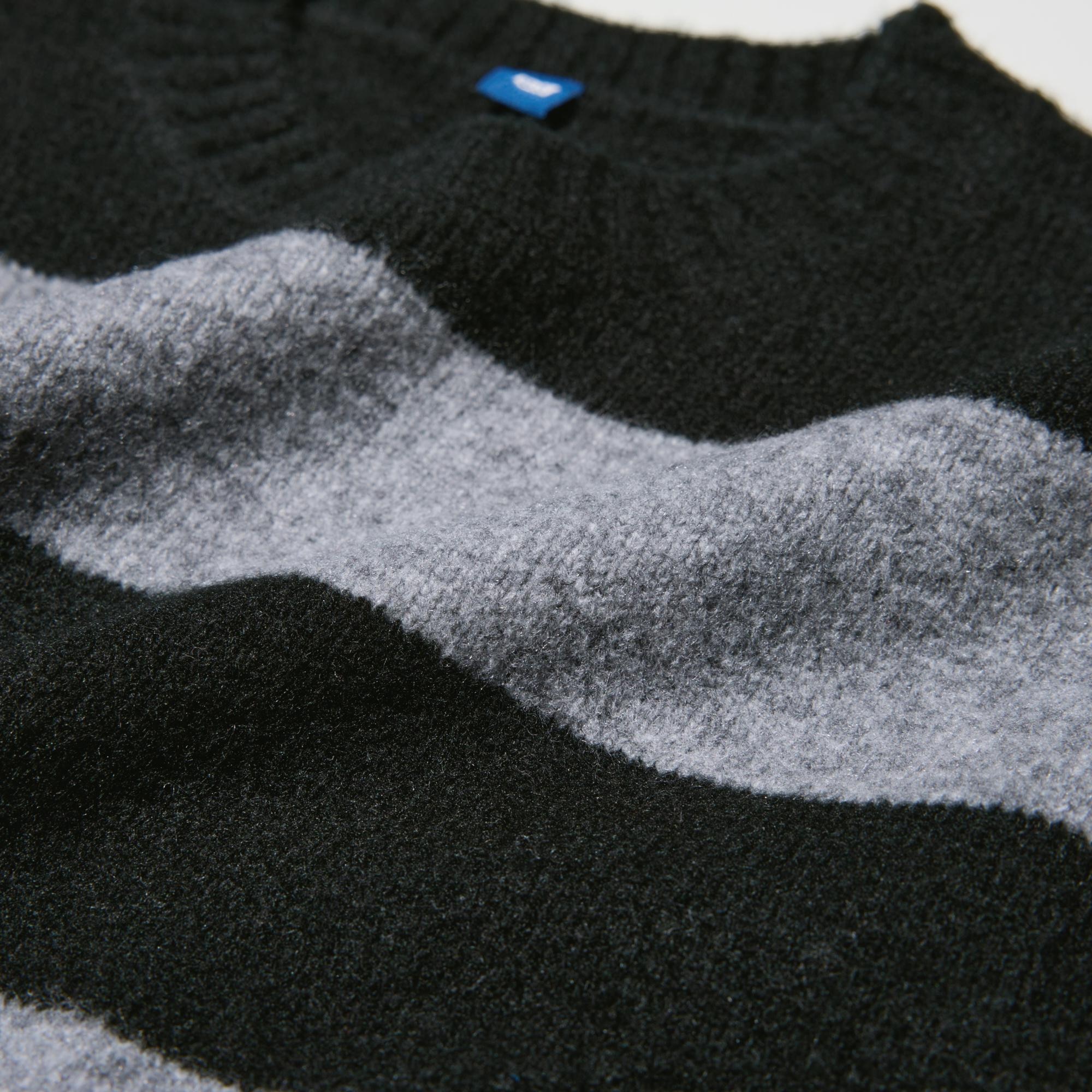 Lightweight, non-itchy 'Souffle Yarn' is specially brushed for extra warmth and softness.