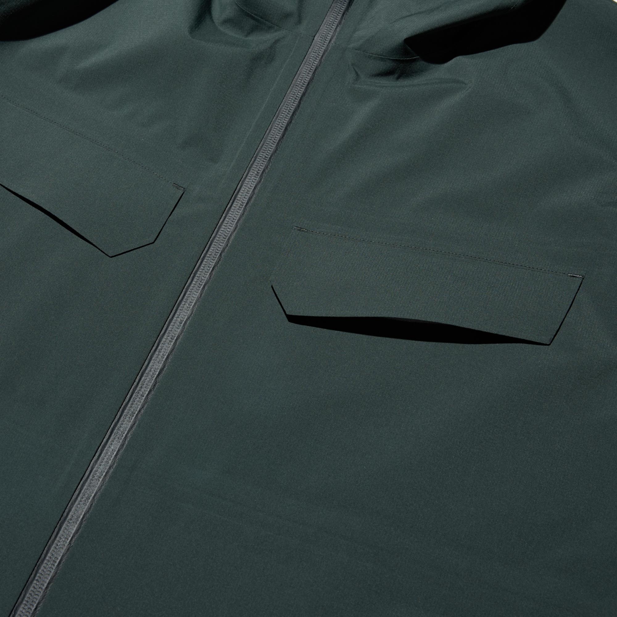 With a utility pocket at the chest.