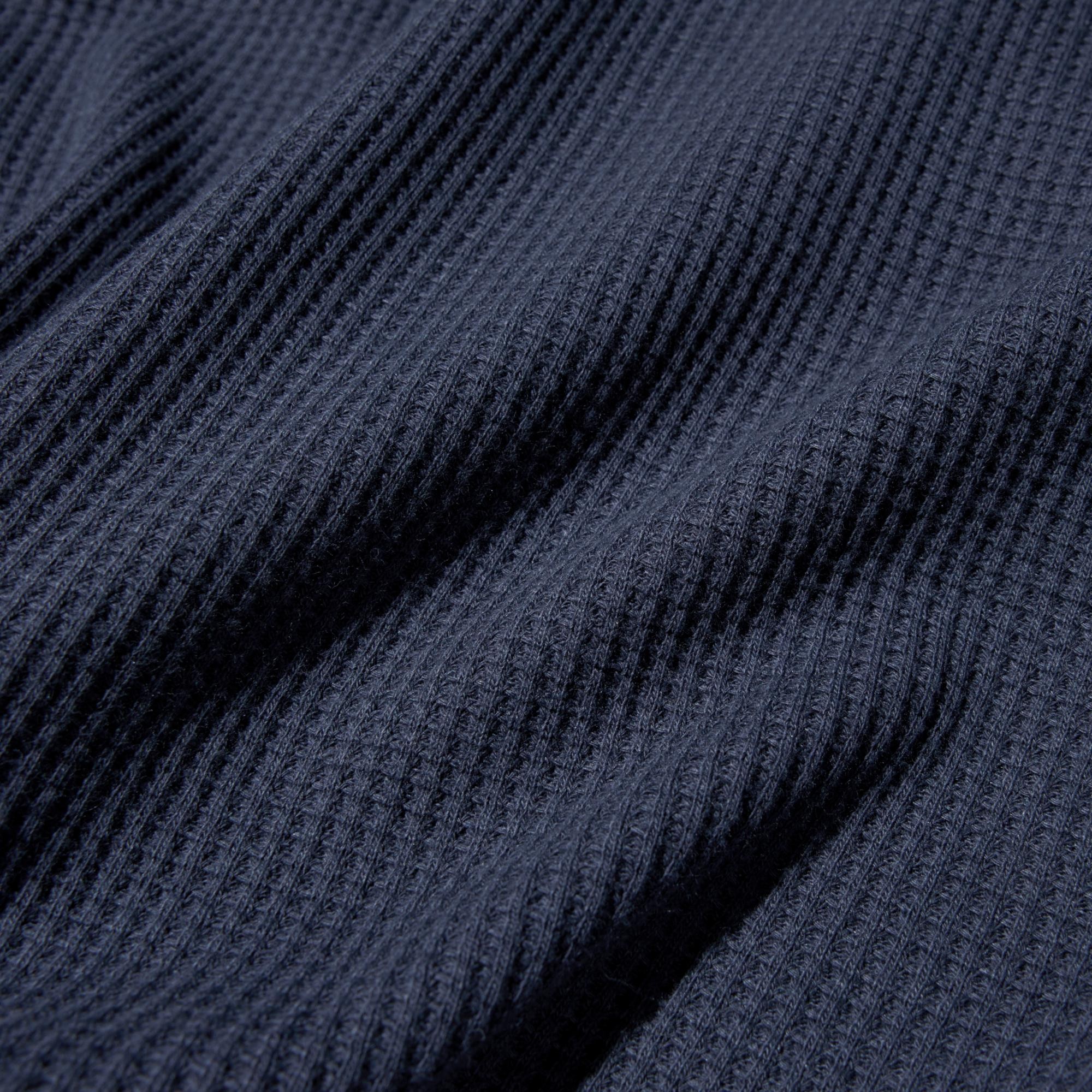 Waffle fabric, specially washed to produce a soft, puffy texture.