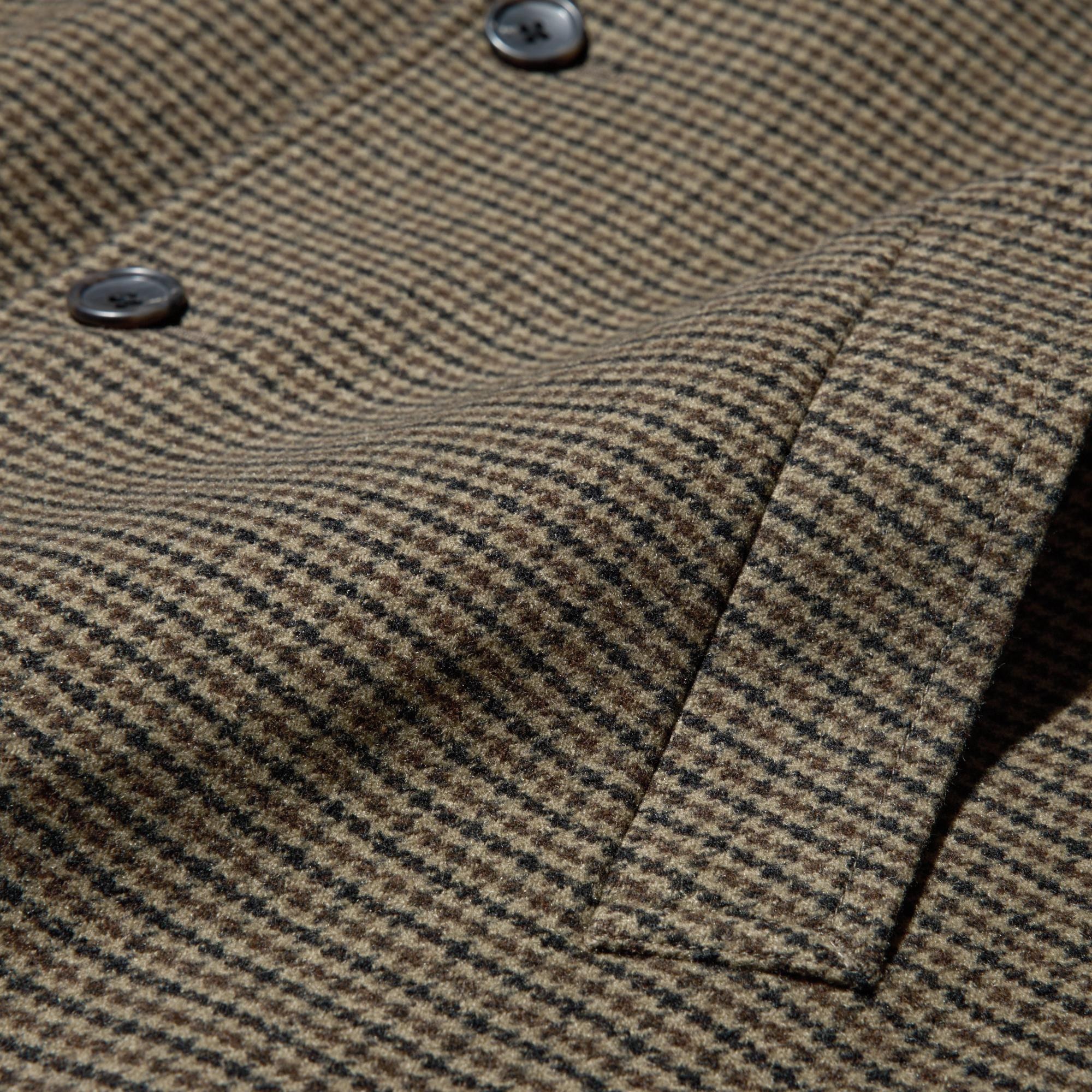 Double face, wool blend fabric is soft and non-itchy. Clean, straight silhouette with the thickness and fullness of double-face fabric.