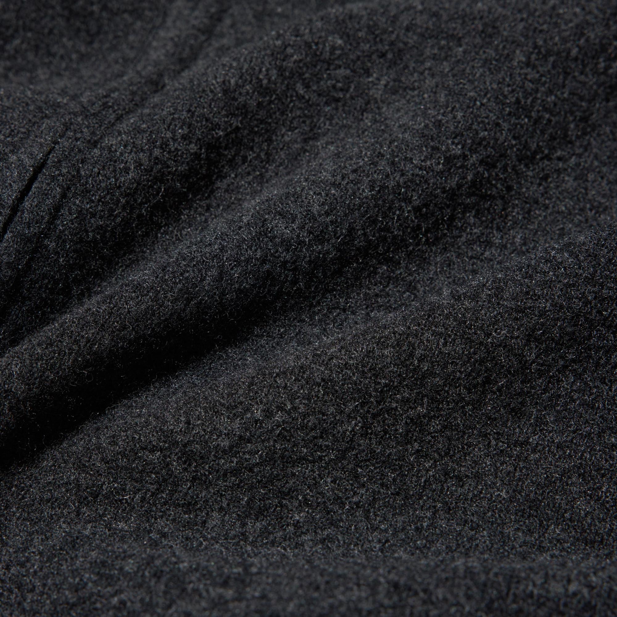 Milled wool-blend fabric with a soft, yet moderately crisp, feel.