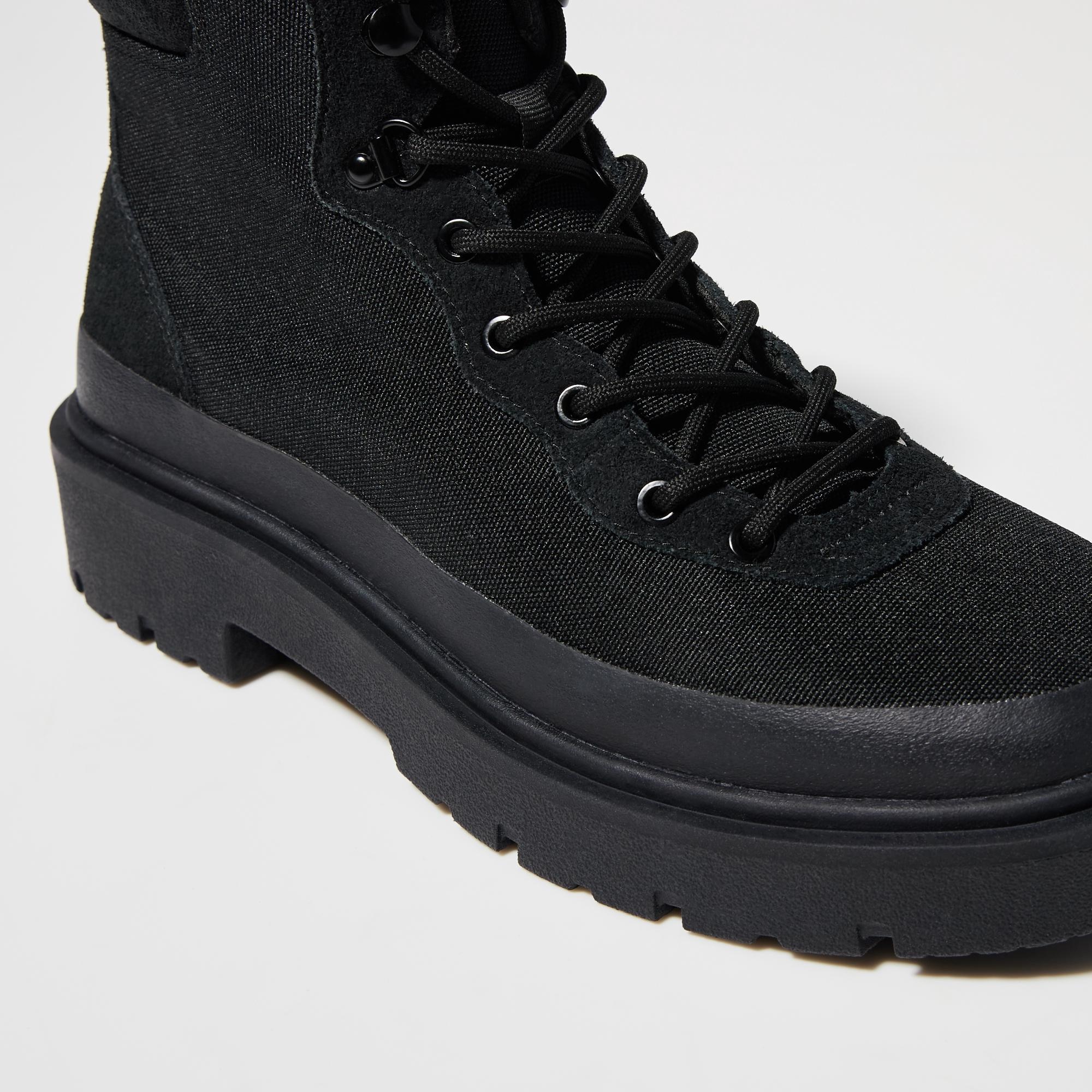 Thick soles add an accent to any outfit. We’ve added tape to the outside of the uppers for style and durability.